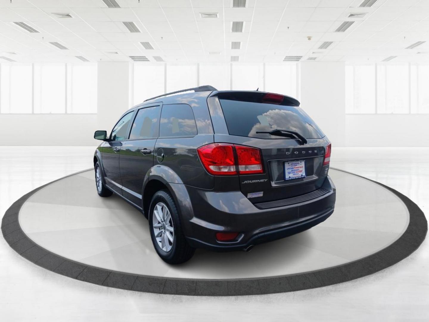 2014 Granite Crystal Met CC Dodge Journey (3C4PDCBG7ET) with an 3.6L V6 DOHC 24V engine, 6-Speed Automatic transmission, located at 880 E. National Road, Vandalia, OH, 45377, (937) 908-9800, 39.891918, -84.183594 - Photo#4