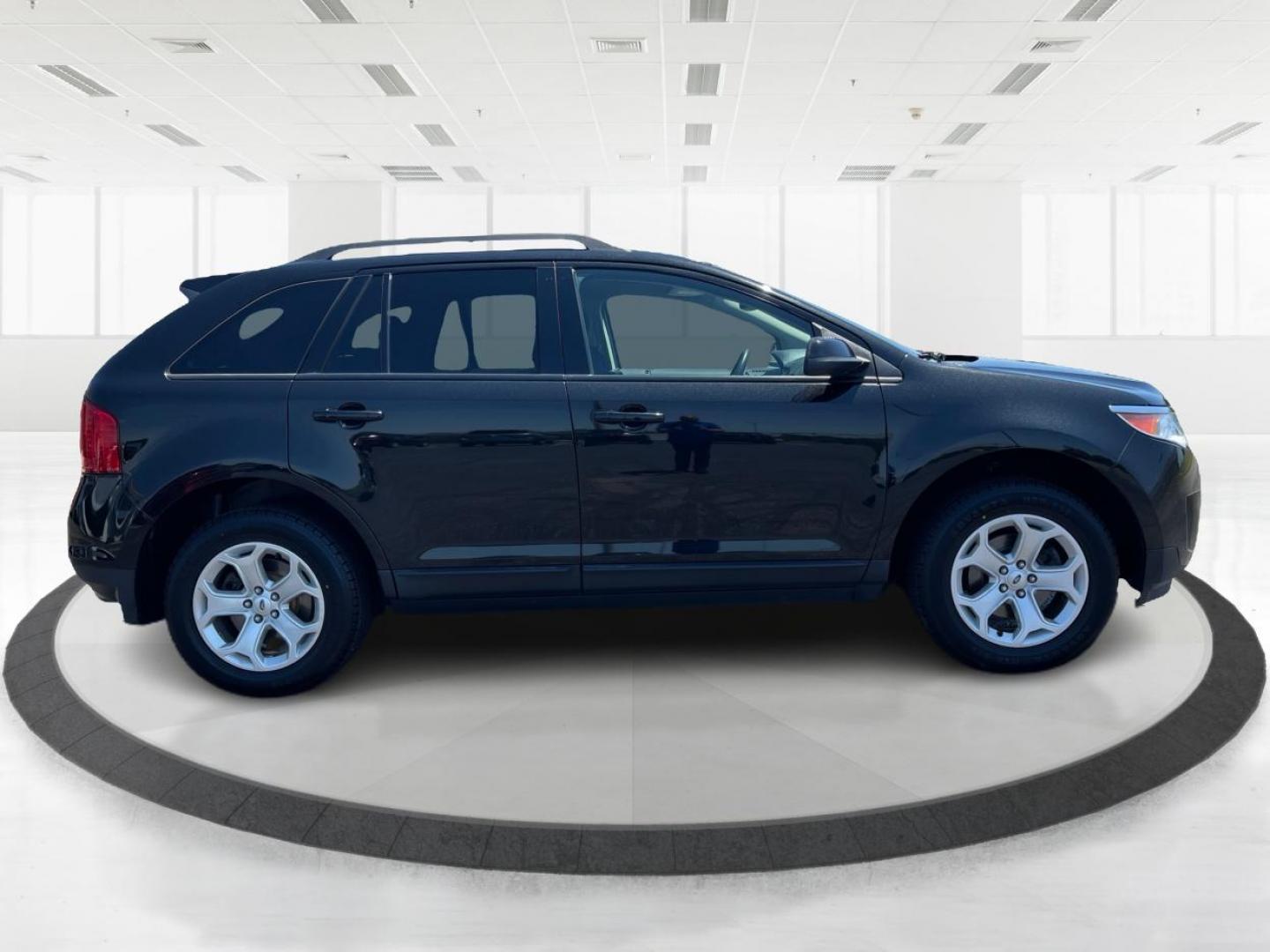 2014 Tuxedo Black Metallic Ford Edge SEL AWD (2FMDK4JCXEB) with an 3.5L V6 DOHC 24V engine, 6-Speed Automatic transmission, located at 1184 Kauffman Ave, Fairborn, OH, 45324, (937) 908-9800, 39.807072, -84.030914 - Photo#1