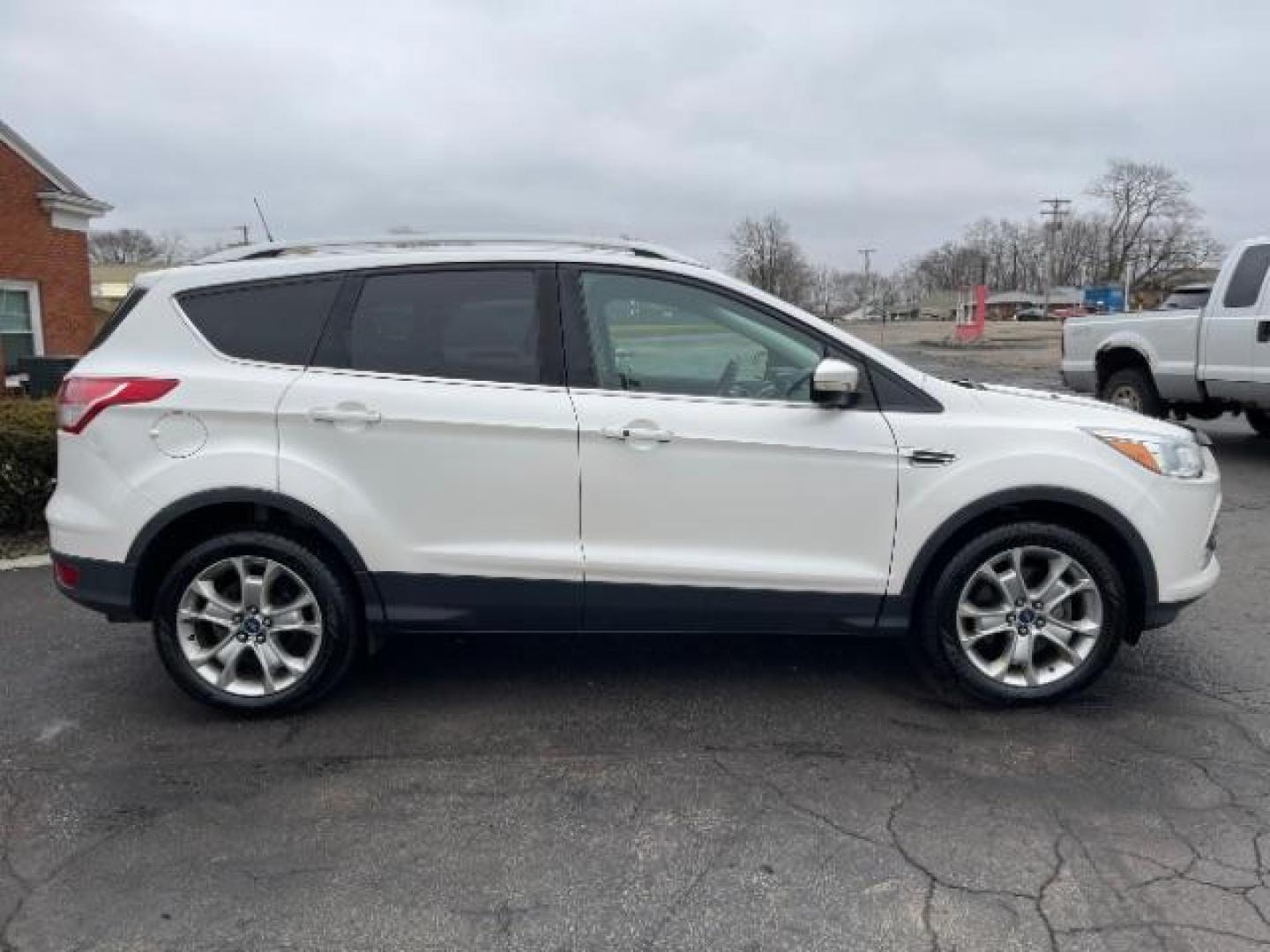 2014 White Platinum Tricoat Ford Escape Titanium 4WD (1FMCU9J95EU) with an 2.0L L4 DOHC 16V engine, 6-Speed Automatic transmission, located at 1184 Kauffman Ave, Fairborn, OH, 45324, (937) 908-9800, 39.807072, -84.030914 - Photo#5