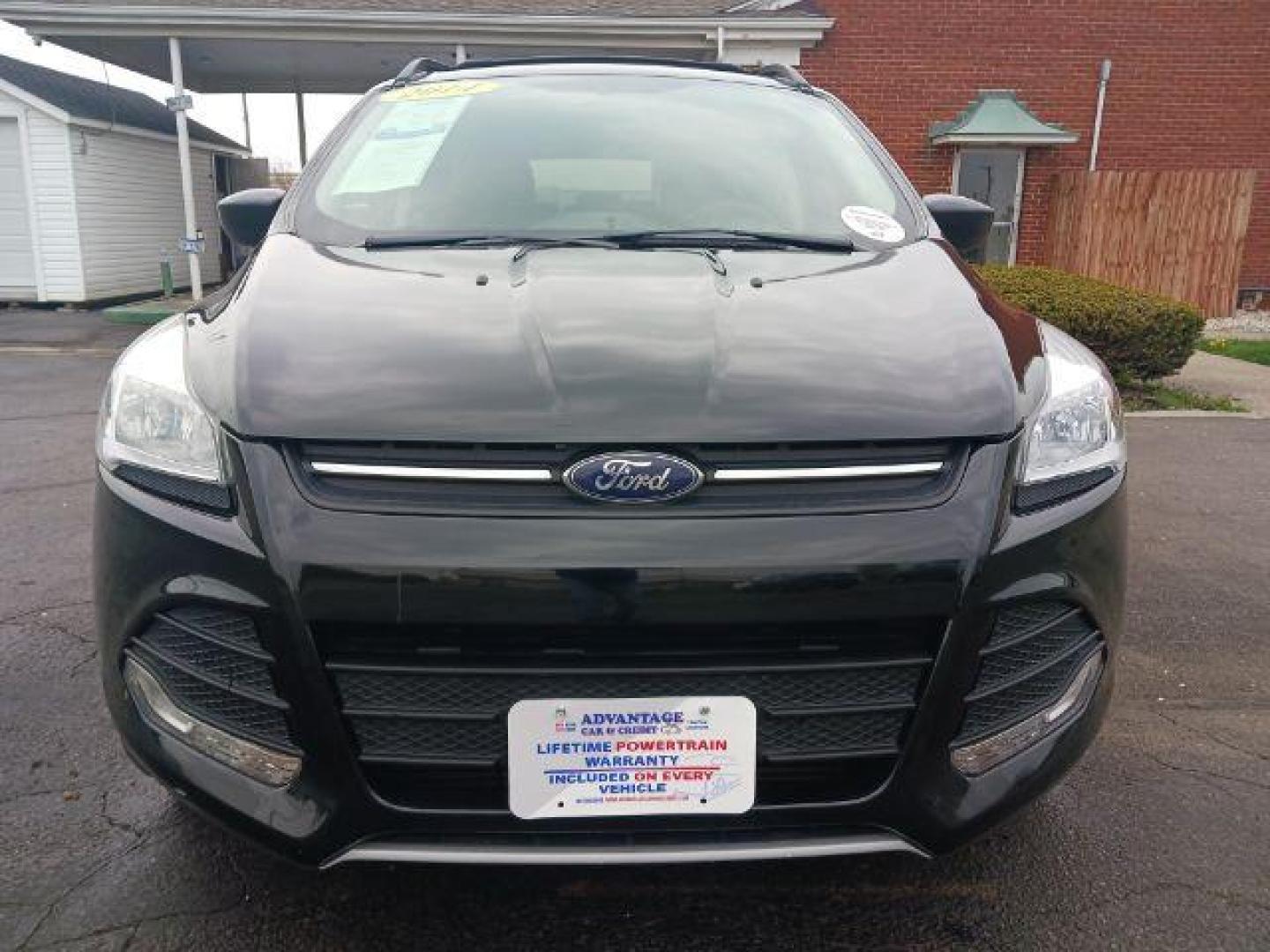 2014 Tuxedo Black Ford Escape SE 4WD (1FMCU9G99EU) with an 2.0L L4 DOHC 16V engine, 6-Speed Automatic transmission, located at 4508 South Dixie Dr, Moraine, OH, 45439, (937) 908-9800, 39.689976, -84.218452 - Photo#1