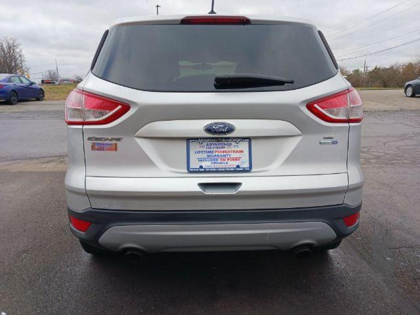 2014 Ingot Silver Metallic Ford Escape SE 4WD (1FMCU9G92EU) with an 2.0L L4 DOHC 16V engine, 6-Speed Automatic transmission, located at 1951 S Dayton Lakeview Rd., New Carlisle, OH, 45344, (937) 908-9800, 39.890999, -84.050255 - Photo#5