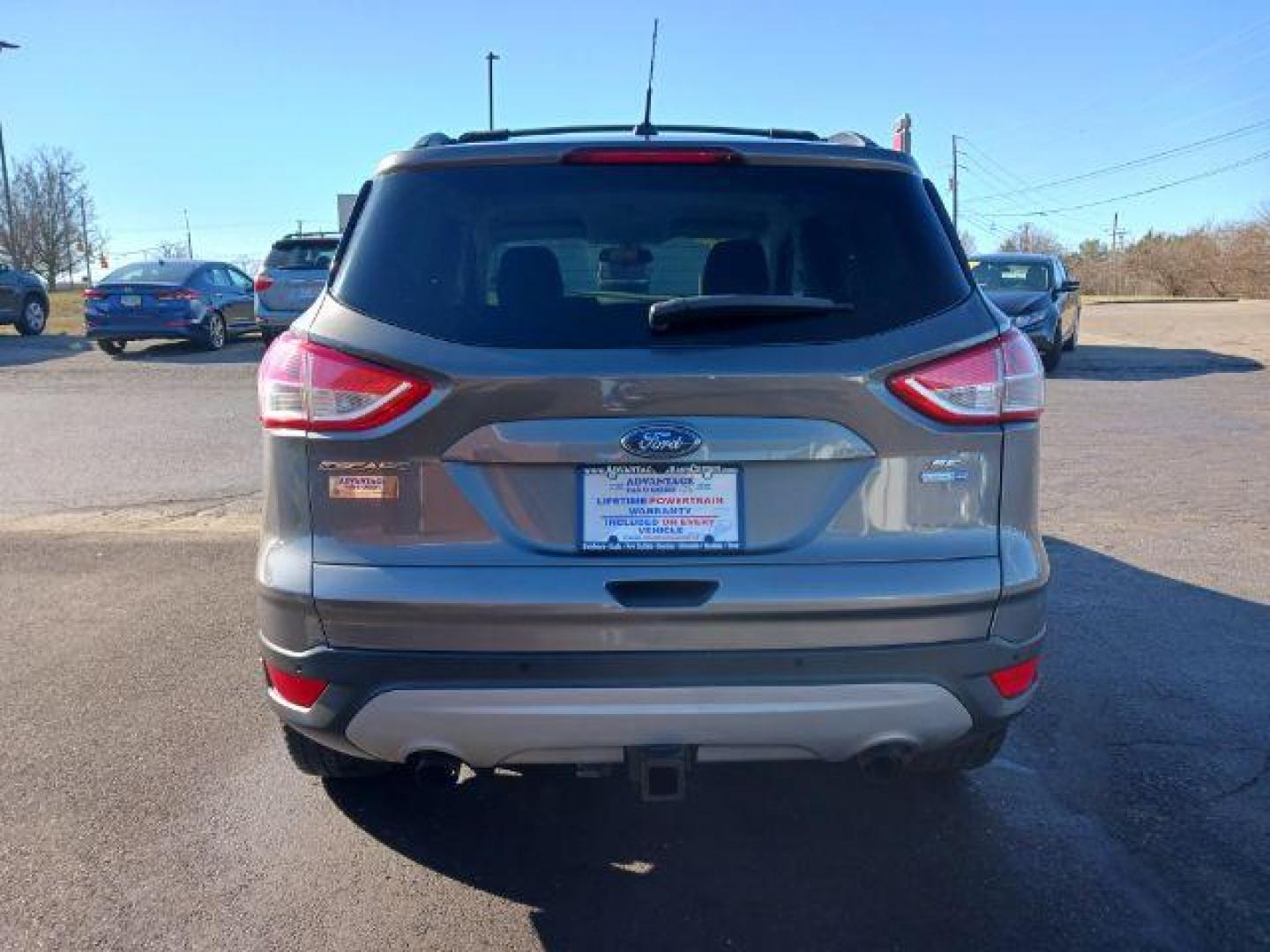 2014 Sterling Gray Metallic Ford Escape SE 4WD (1FMCU9G98EU) with an 2.0L L4 DOHC 16V engine, 6-Speed Automatic transmission, located at 401 Woodman Dr, Riverside, OH, 45431, (937) 908-9800, 39.760899, -84.123421 - Photo#5