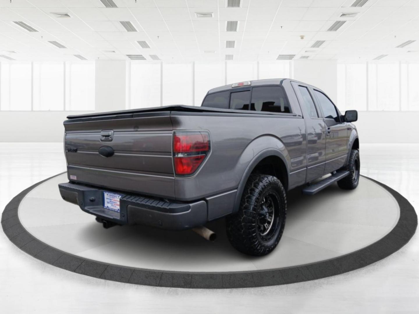 2014 Sterling Gray Metallic Ford F-150 FX4 SuperCab 6.5-ft. Bed 4WD (1FTFX1EF1EK) with an 5.0L V8 engine, 6-Speed Automatic transmission, located at 1184 Kauffman Ave, Fairborn, OH, 45324, (937) 908-9800, 39.807072, -84.030914 - Photo#2