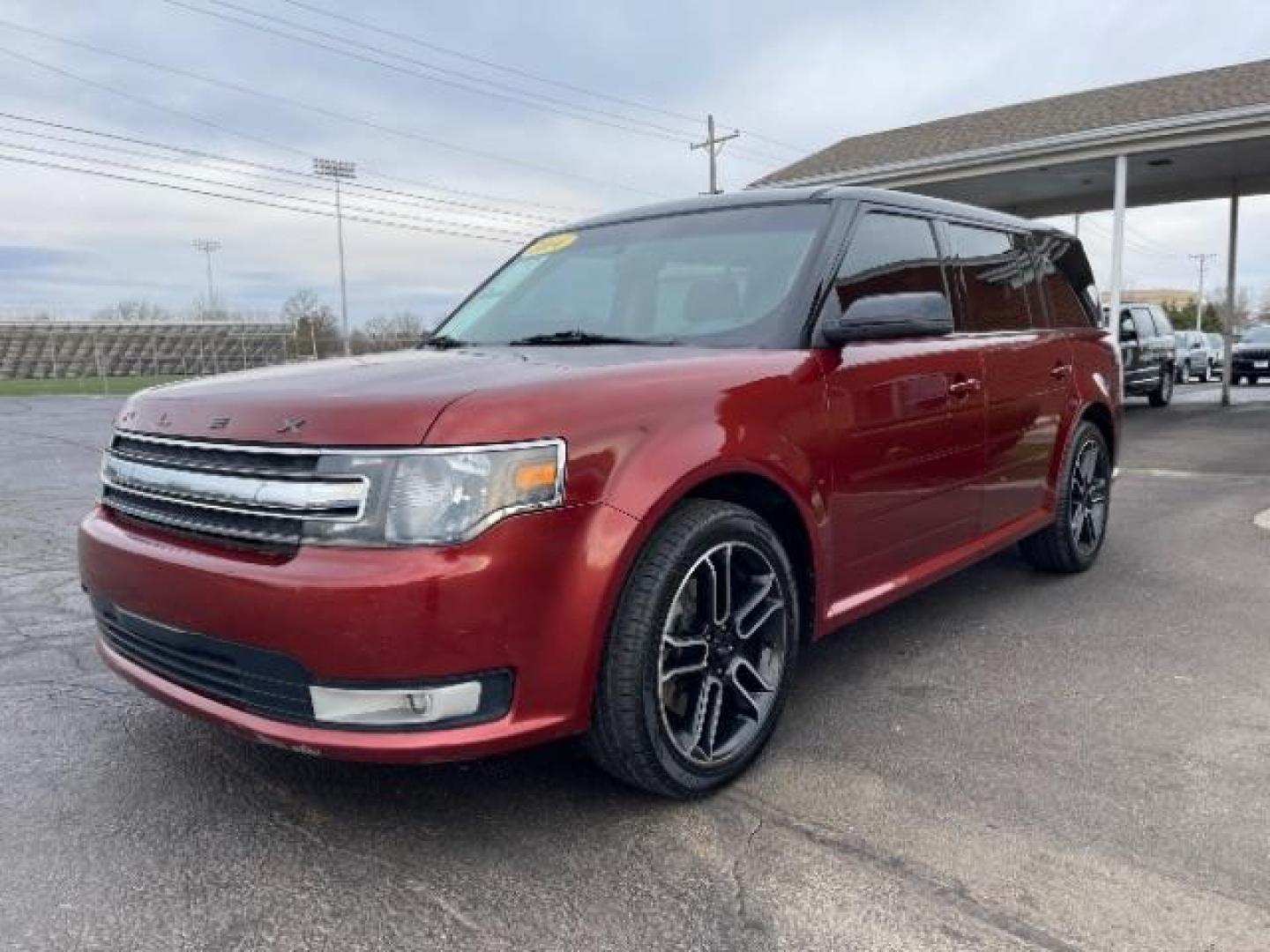 2014 Orange Ford Flex SEL FWD (2FMGK5C89EB) with an 3.5L V6 DOHC 24V engine, 6-Speed Automatic Overdrive transmission, located at 401 Woodman Dr, Riverside, OH, 45431, (937) 908-9800, 39.760899, -84.123421 - Photo#1