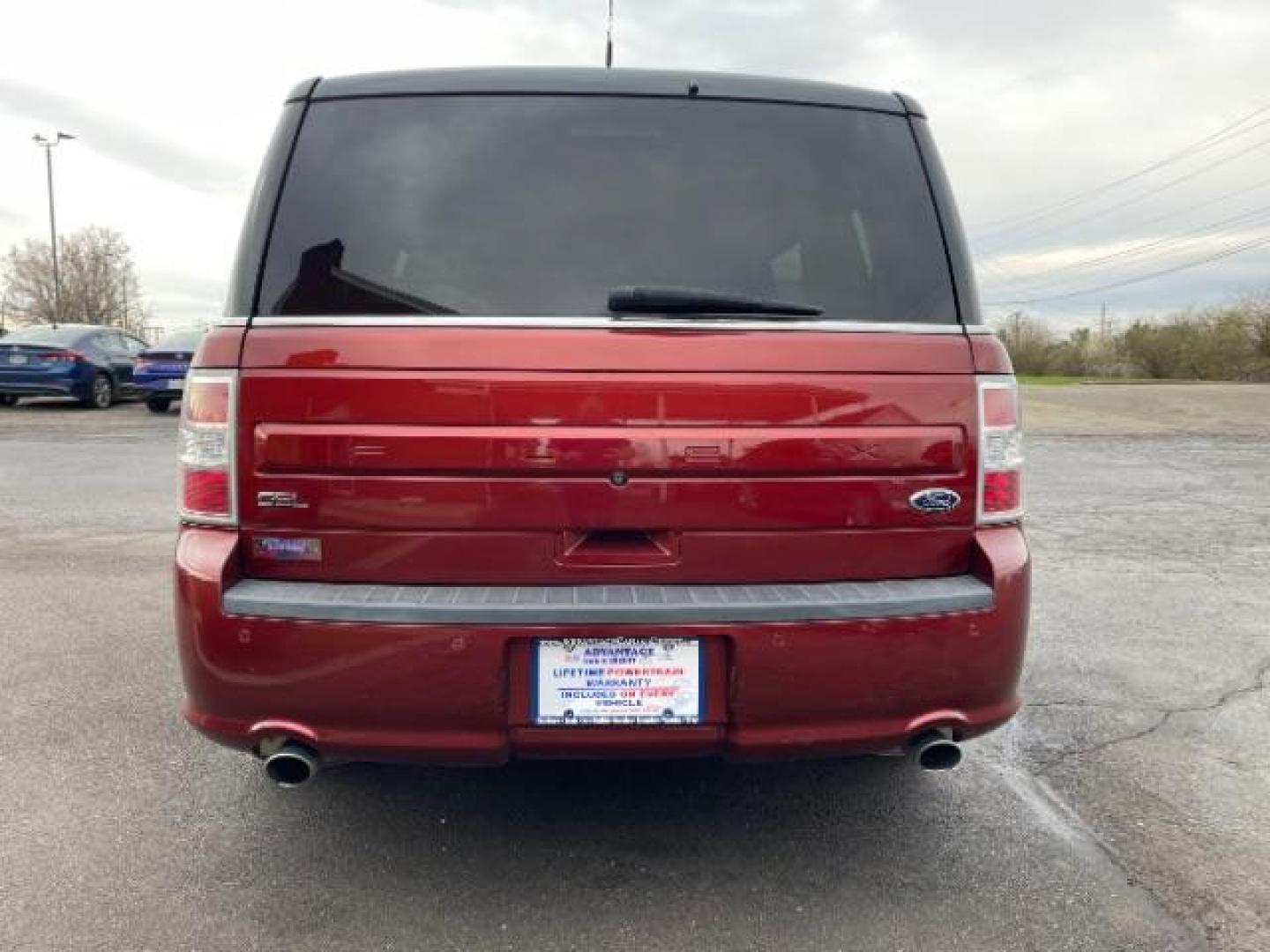 2014 Orange Ford Flex SEL FWD (2FMGK5C89EB) with an 3.5L V6 DOHC 24V engine, 6-Speed Automatic Overdrive transmission, located at 401 Woodman Dr, Riverside, OH, 45431, (937) 908-9800, 39.760899, -84.123421 - Photo#5