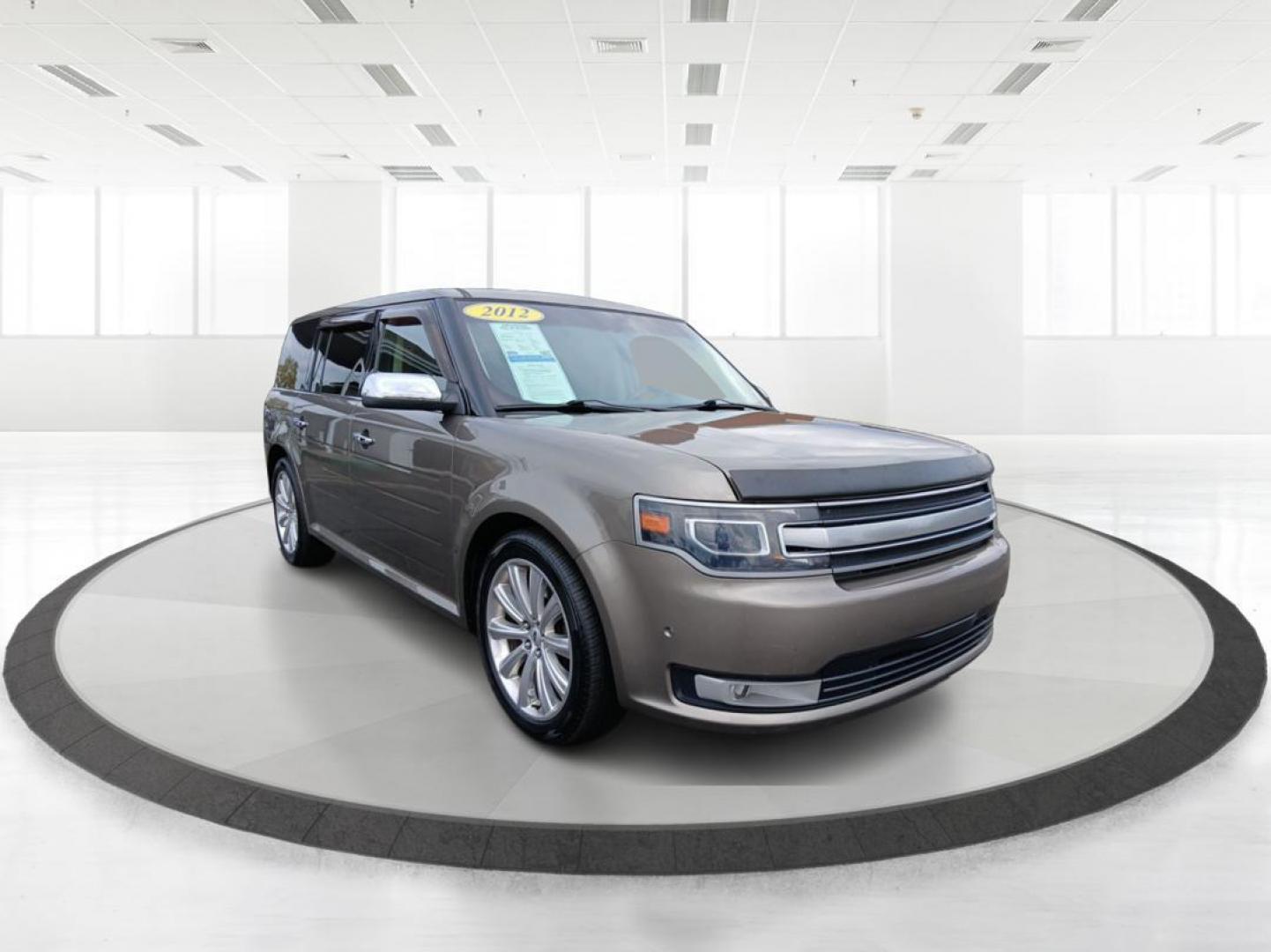 2014 Mineral Gray Metallic Ford Flex Limited AWD w/EcoBoost (2FMHK6DTXEB) with an 3.5L V6 DOHC 24V engine, 6-Speed Automatic Overdrive transmission, located at 401 Woodman Dr, Riverside, OH, 45431, (937) 908-9800, 39.760899, -84.123421 - Photo#0