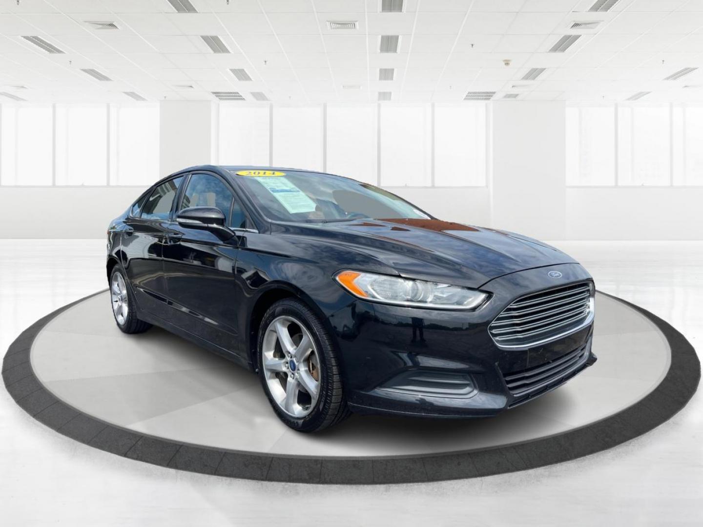 2014 Tuxedo Black Metallic Ford Fusion (1FA6P0HD4E5) with an 1.5L L4 DOHC 16V engine, located at 4508 South Dixie Dr, Moraine, OH, 45439, (937) 908-9800, 39.689976, -84.218452 - Photo#0