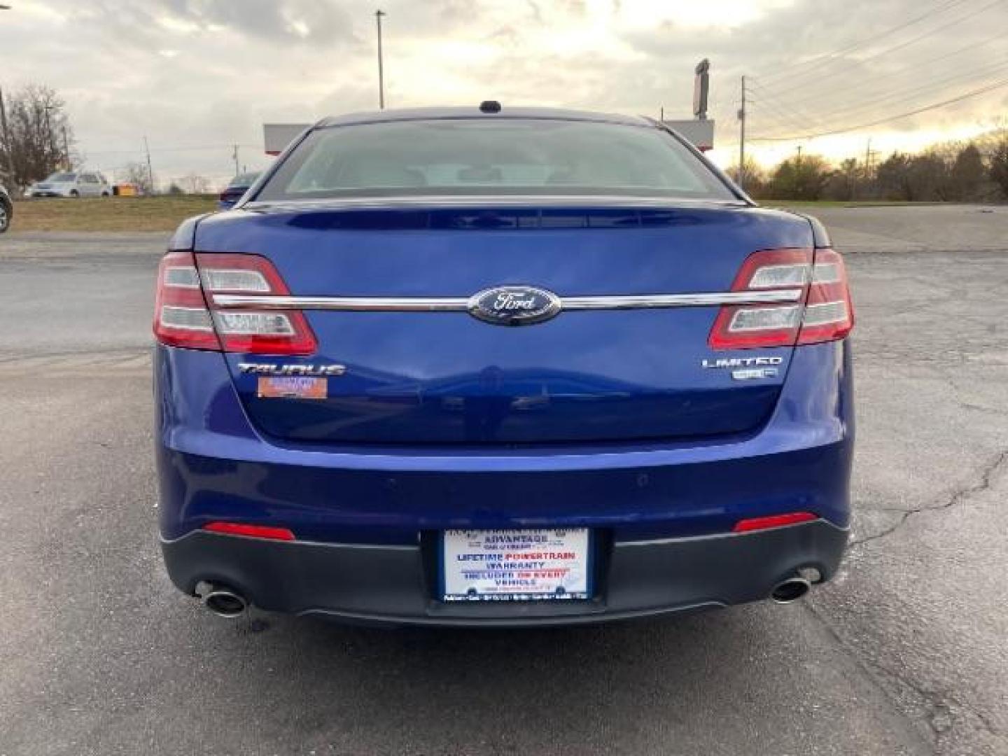 2014 Deep Impact Blue Metallic Ford Taurus Limited AWD (1FAHP2J86EG) with an 3.5L V6 DOHC 24V engine, 6-Speed Automatic transmission, located at 1230 East Main St, Xenia, OH, 45385, (937) 908-9800, 39.688026, -83.910172 - Photo#3