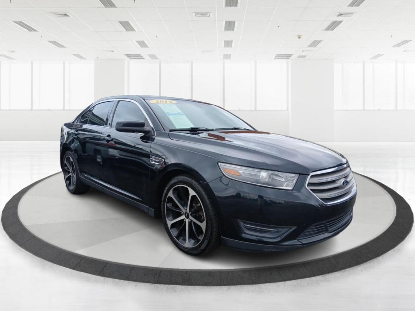 2014 Tuxedo Black Metallic Ford Taurus SEL AWD (1FAHP2H80EG) with an 3.5L V6 DOHC 24V engine, 6-Speed Automatic transmission, located at 401 Woodman Dr, Riverside, OH, 45431, (937) 908-9800, 39.760899, -84.123421 - Photo#0