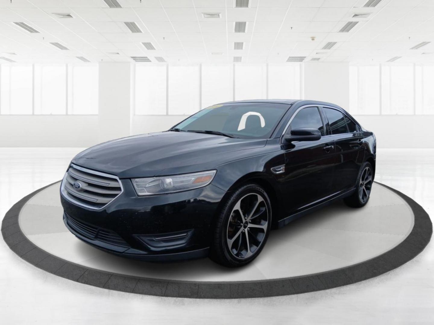 2014 Tuxedo Black Metallic Ford Taurus SEL AWD (1FAHP2H80EG) with an 3.5L V6 DOHC 24V engine, 6-Speed Automatic transmission, located at 401 Woodman Dr, Riverside, OH, 45431, (937) 908-9800, 39.760899, -84.123421 - Photo#7