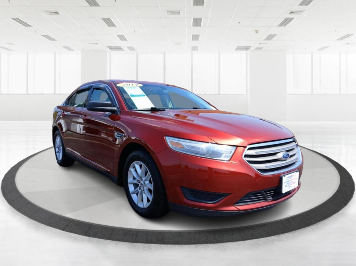 2014 Sunset Metallic Ford Taurus SE FWD (1FAHP2D88EG) with an 3.5L V6 DOHC 24V engine, 6-Speed Automatic transmission, located at 1099 N County Rd 25A , Troy, OH, 45373, (937) 908-9800, 40.057079, -84.212883 - Photo#0