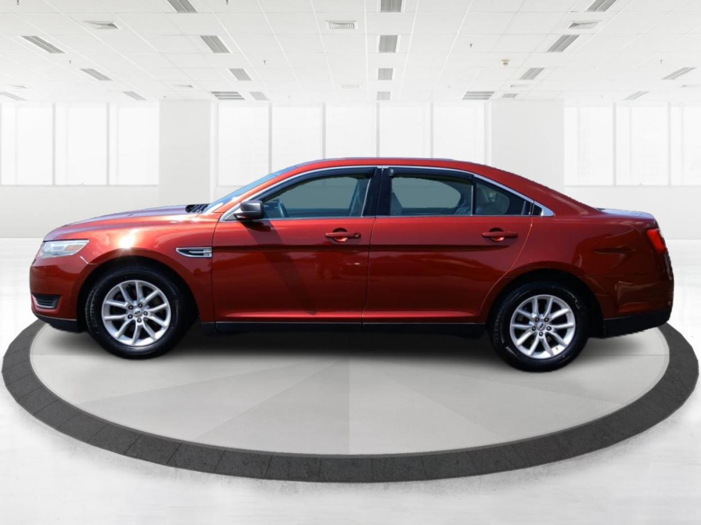 2014 Sunset Metallic Ford Taurus SE FWD (1FAHP2D88EG) with an 3.5L V6 DOHC 24V engine, 6-Speed Automatic transmission, located at 1099 N County Rd 25A , Troy, OH, 45373, (937) 908-9800, 40.057079, -84.212883 - Photo#5