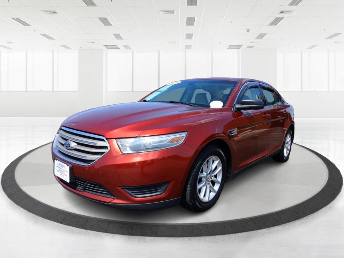 2014 Sunset Metallic Ford Taurus SE FWD (1FAHP2D88EG) with an 3.5L V6 DOHC 24V engine, 6-Speed Automatic transmission, located at 1099 N County Rd 25A , Troy, OH, 45373, (937) 908-9800, 40.057079, -84.212883 - Photo#7