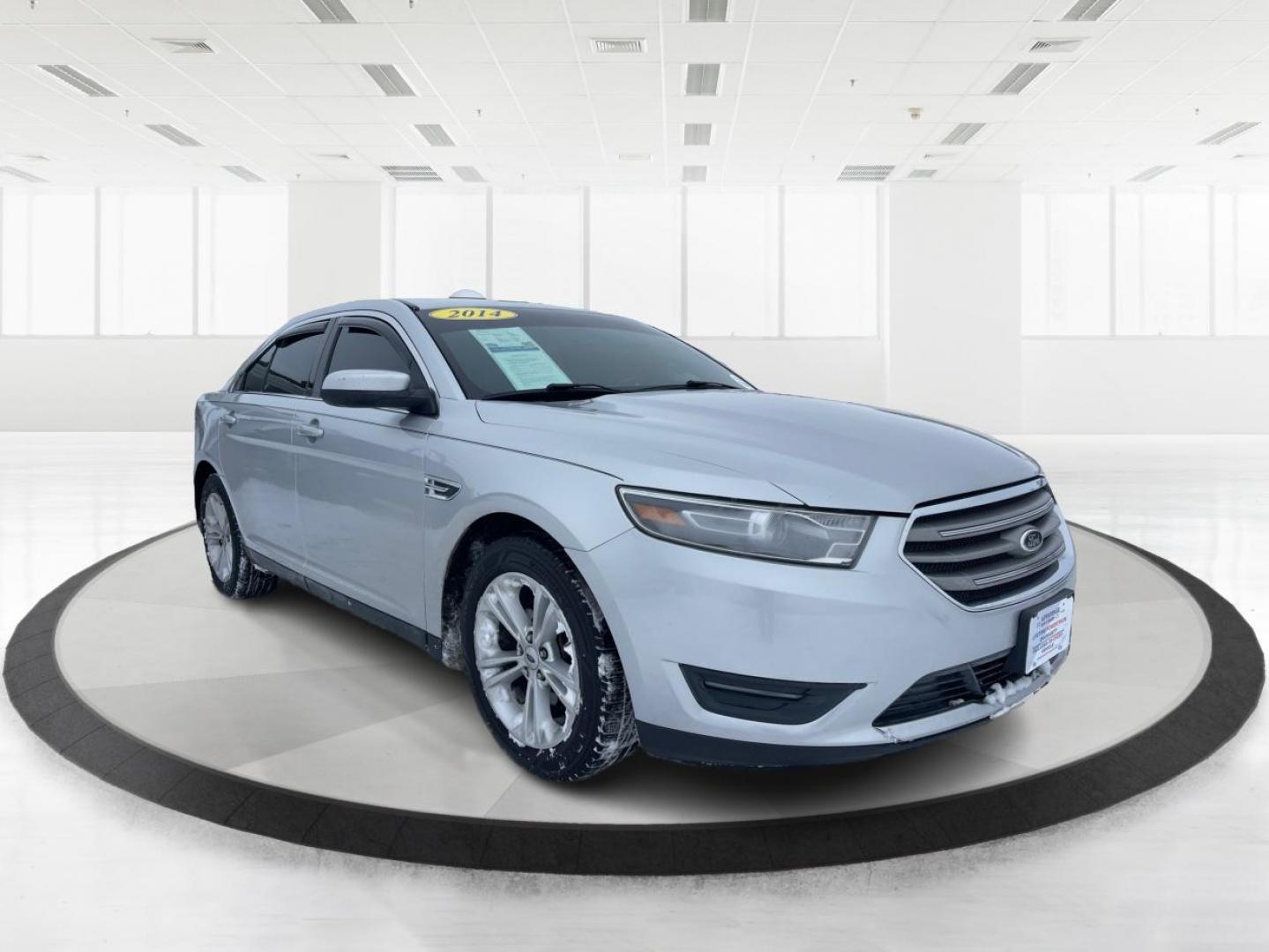 2014 Ford Taurus SEL FWD (1FAHP2E80EG) with an 3.5L V6 DOHC 24V engine, 6-Speed Automatic transmission, located at 880 E. National Road, Vandalia, OH, 45377, (937) 908-9800, 39.891918, -84.183594 - 2014 Ford Taurus SEL FWD - Photo#0