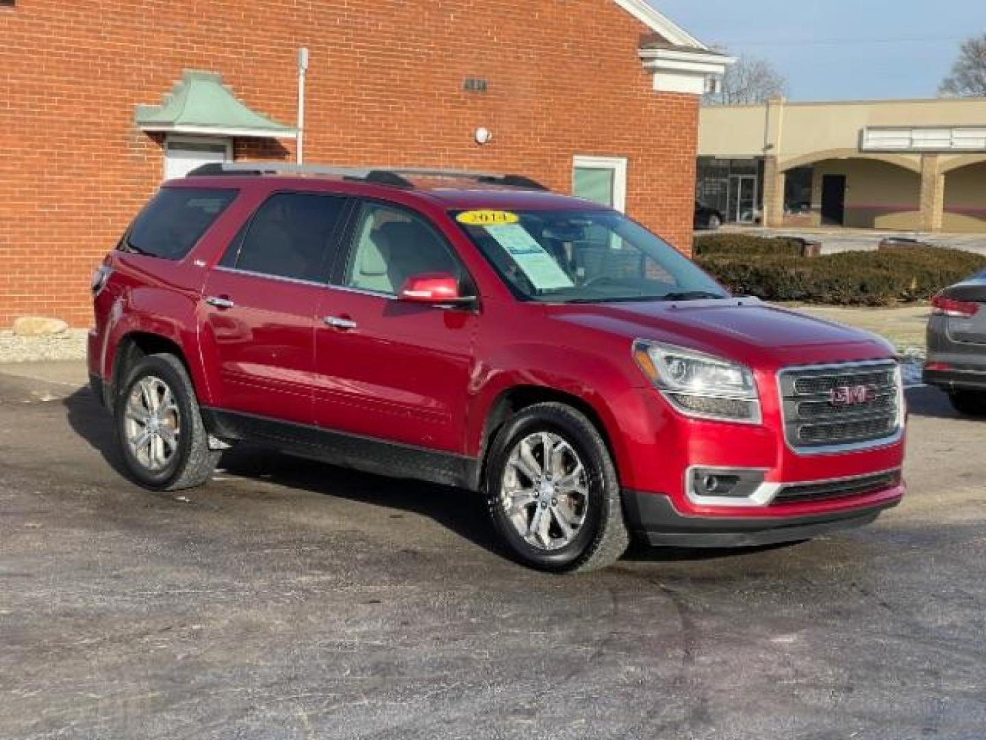 2014 Crystal Red Tintcoat GMC Acadia SLT-1 FWD (1GKKRRKDXEJ) with an 3.6L V6 DOHC 24V engine, 6-Speed Automatic transmission, located at 1951 S Dayton Lakeview Rd., New Carlisle, OH, 45344, (937) 908-9800, 39.890999, -84.050255 - Photo#0