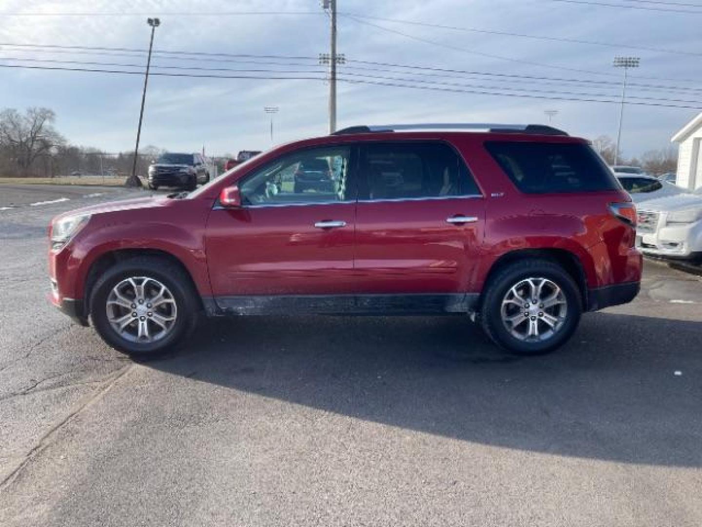 2014 Crystal Red Tintcoat GMC Acadia SLT-1 FWD (1GKKRRKDXEJ) with an 3.6L V6 DOHC 24V engine, 6-Speed Automatic transmission, located at 1951 S Dayton Lakeview Rd., New Carlisle, OH, 45344, (937) 908-9800, 39.890999, -84.050255 - Photo#3