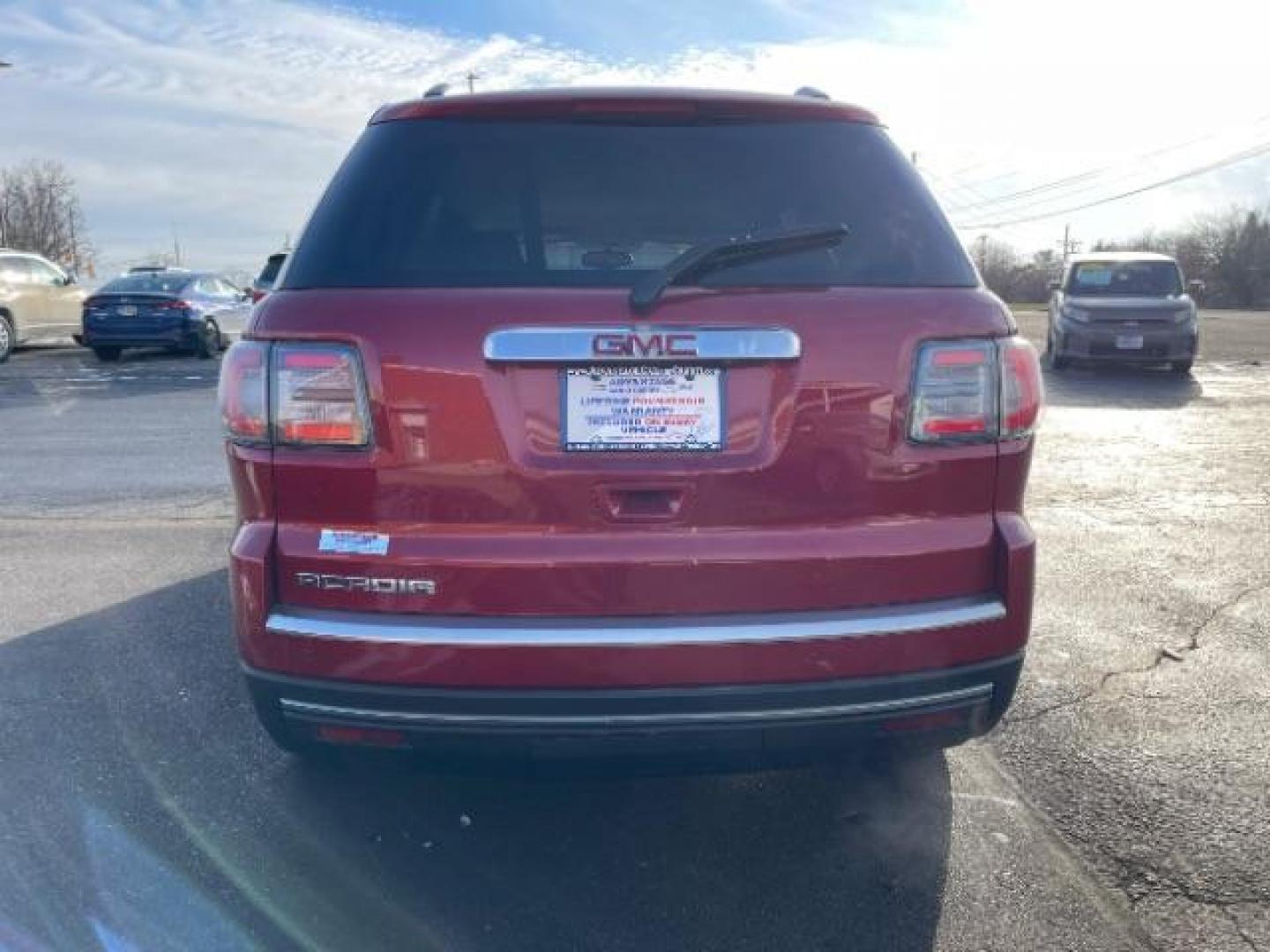 2014 Crystal Red Tintcoat GMC Acadia SLT-1 FWD (1GKKRRKDXEJ) with an 3.6L V6 DOHC 24V engine, 6-Speed Automatic transmission, located at 1951 S Dayton Lakeview Rd., New Carlisle, OH, 45344, (937) 908-9800, 39.890999, -84.050255 - Photo#5