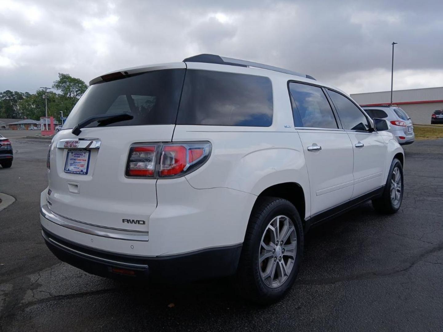 2014 Summit White GMC Acadia SLT-1 AWD (1GKKVRKD8EJ) with an 3.6L V6 DOHC 24V engine, 6-Speed Automatic transmission, located at 1951 S Dayton Lakeview Rd., New Carlisle, OH, 45344, (937) 908-9800, 39.890999, -84.050255 - Photo#1