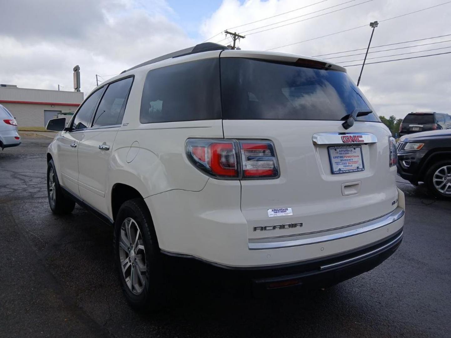 2014 Summit White GMC Acadia SLT-1 AWD (1GKKVRKD8EJ) with an 3.6L V6 DOHC 24V engine, 6-Speed Automatic transmission, located at 1951 S Dayton Lakeview Rd., New Carlisle, OH, 45344, (937) 908-9800, 39.890999, -84.050255 - Photo#3