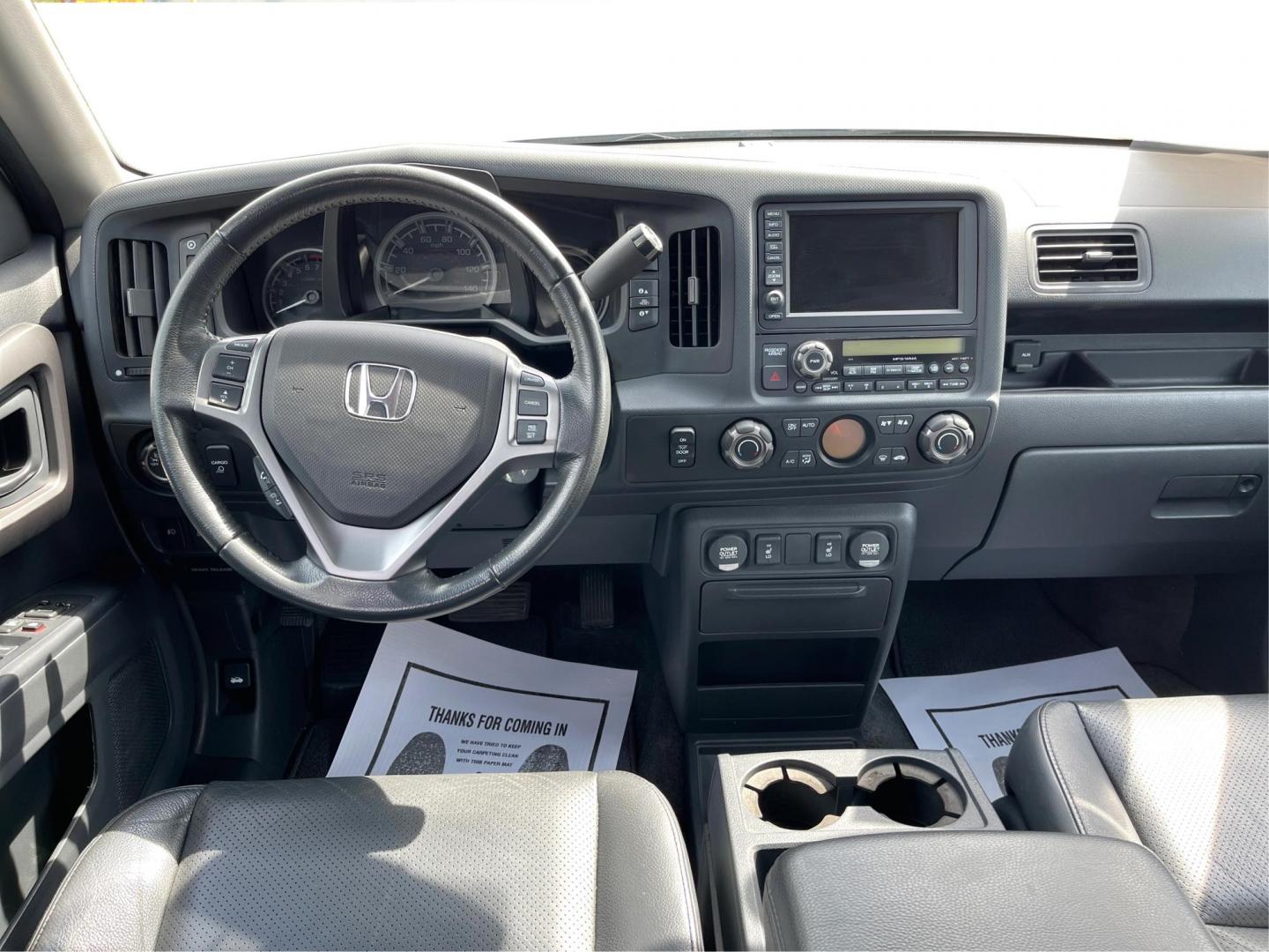 2014 Alabaster Silver Metallic Honda Ridgeline RTL-S (5FPYK1F67EB) with an 3.5L V6 SOHC 24V engine, 5-Speed Automatic transmission, located at 1951 S Dayton Lakeview Rd., New Carlisle, OH, 45344, (937) 908-9800, 39.890999, -84.050255 - Photo#19