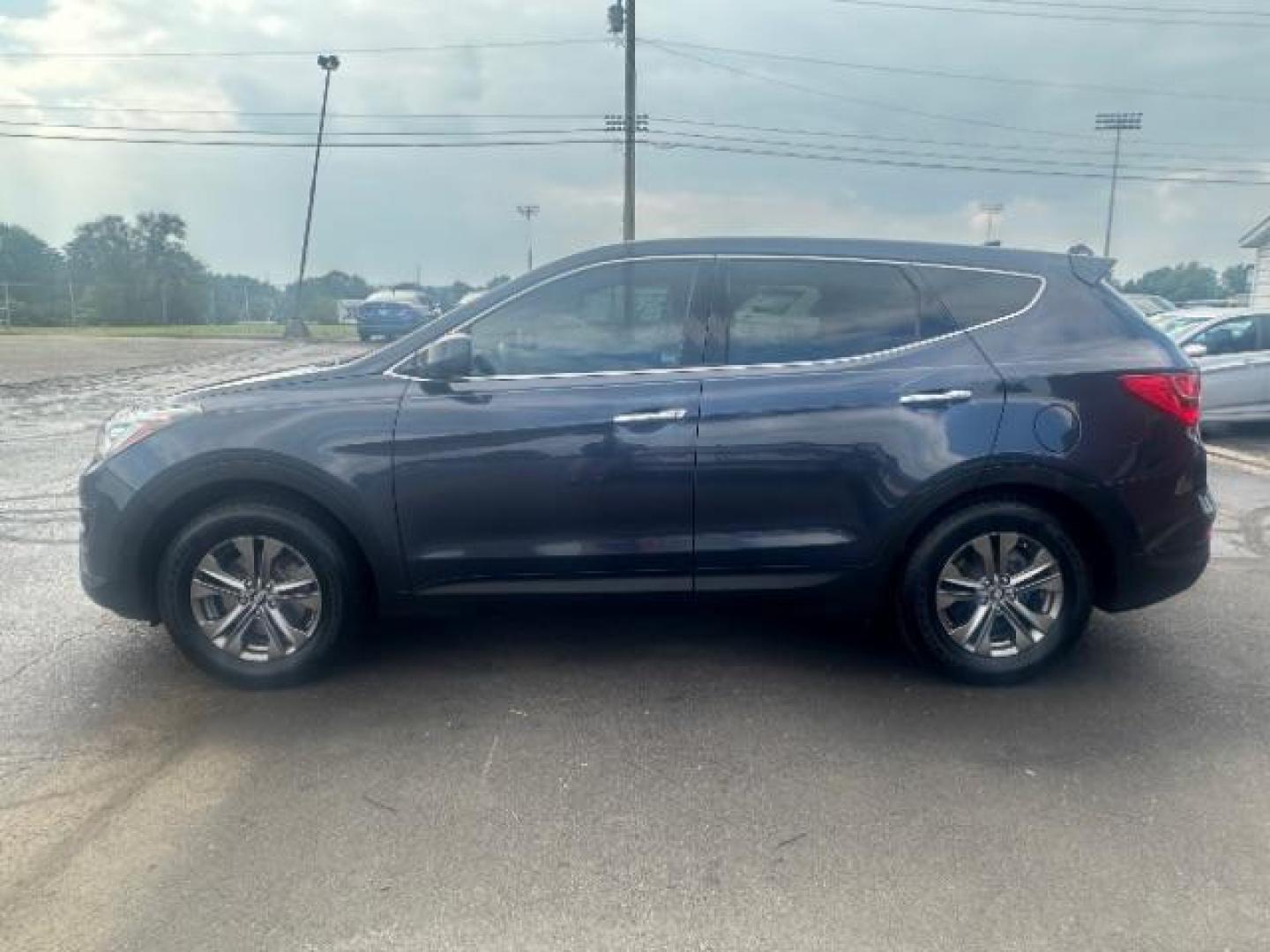 2014 Marlin Blue Hyundai Santa Fe Sport 2.4 FWD (5XYZT3LB3EG) with an 2.4L L4 DOHC 16V engine, 6-Speed Automatic transmission, located at 1230 East Main St, Xenia, OH, 45385, (937) 908-9800, 39.688026, -83.910172 - Photo#3