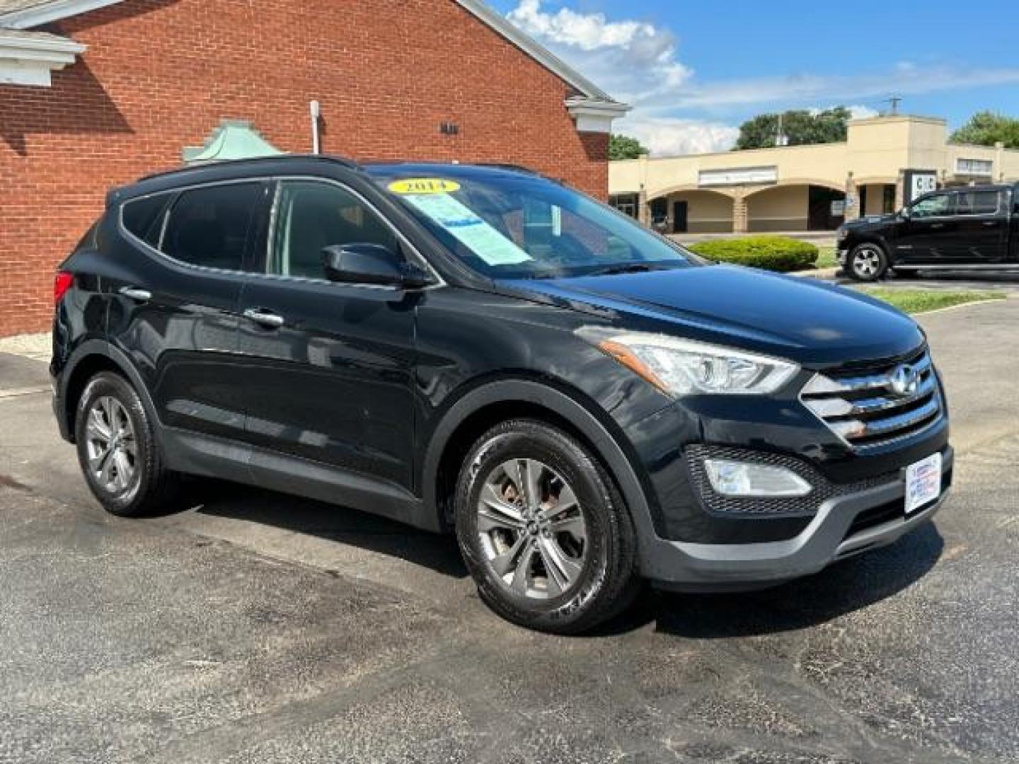 2014 Twilight Black Hyundai Santa Fe Sport 2.4 FWD (5XYZU3LB4EG) with an 2.4L L4 DOHC 16V engine, 6-Speed Automatic transmission, located at 401 Woodman Dr, Riverside, OH, 45431, (937) 908-9800, 39.760899, -84.123421 - Photo#0