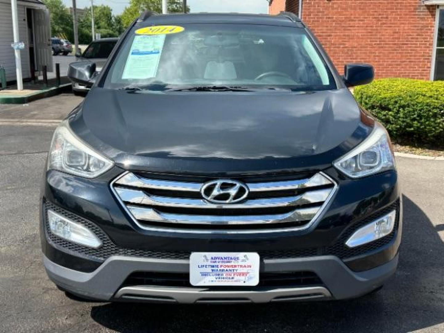 2014 Twilight Black Hyundai Santa Fe Sport 2.4 FWD (5XYZU3LB4EG) with an 2.4L L4 DOHC 16V engine, 6-Speed Automatic transmission, located at 401 Woodman Dr, Riverside, OH, 45431, (937) 908-9800, 39.760899, -84.123421 - Photo#1