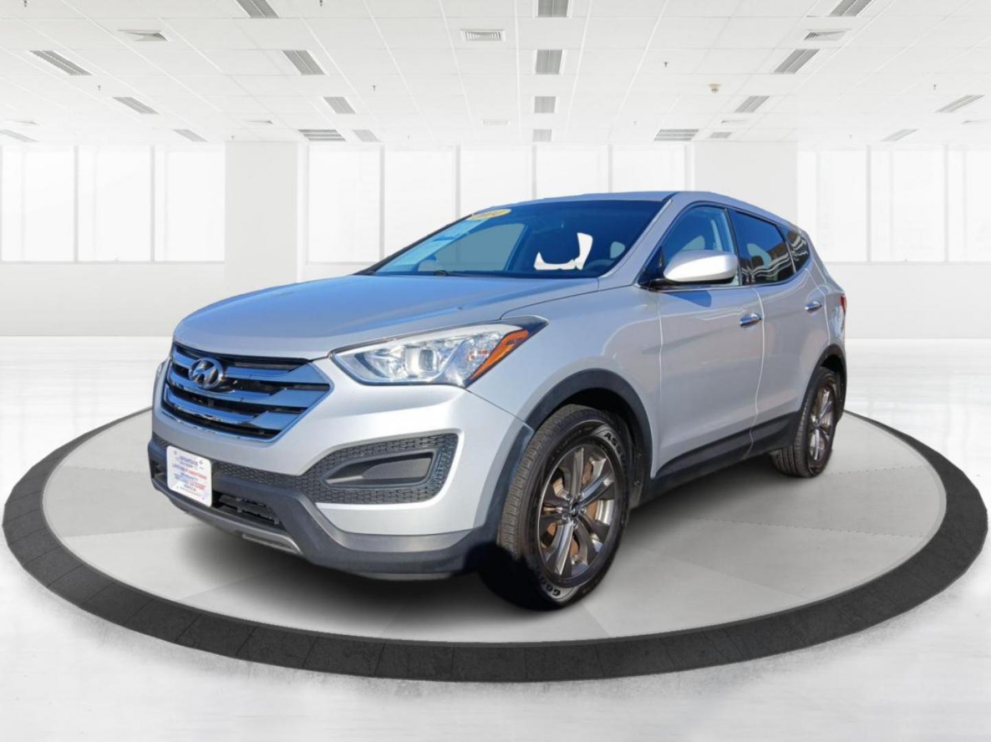 2014 Moonstone Silver Hyundai Santa Fe Sport 2.4 AWD (5XYZTDLB2EG) with an 2.4L L4 DOHC 16V engine, 6-Speed Automatic transmission, located at 1099 N County Rd 25A , Troy, OH, 45373, (937) 908-9800, 40.057079, -84.212883 - Photo#7