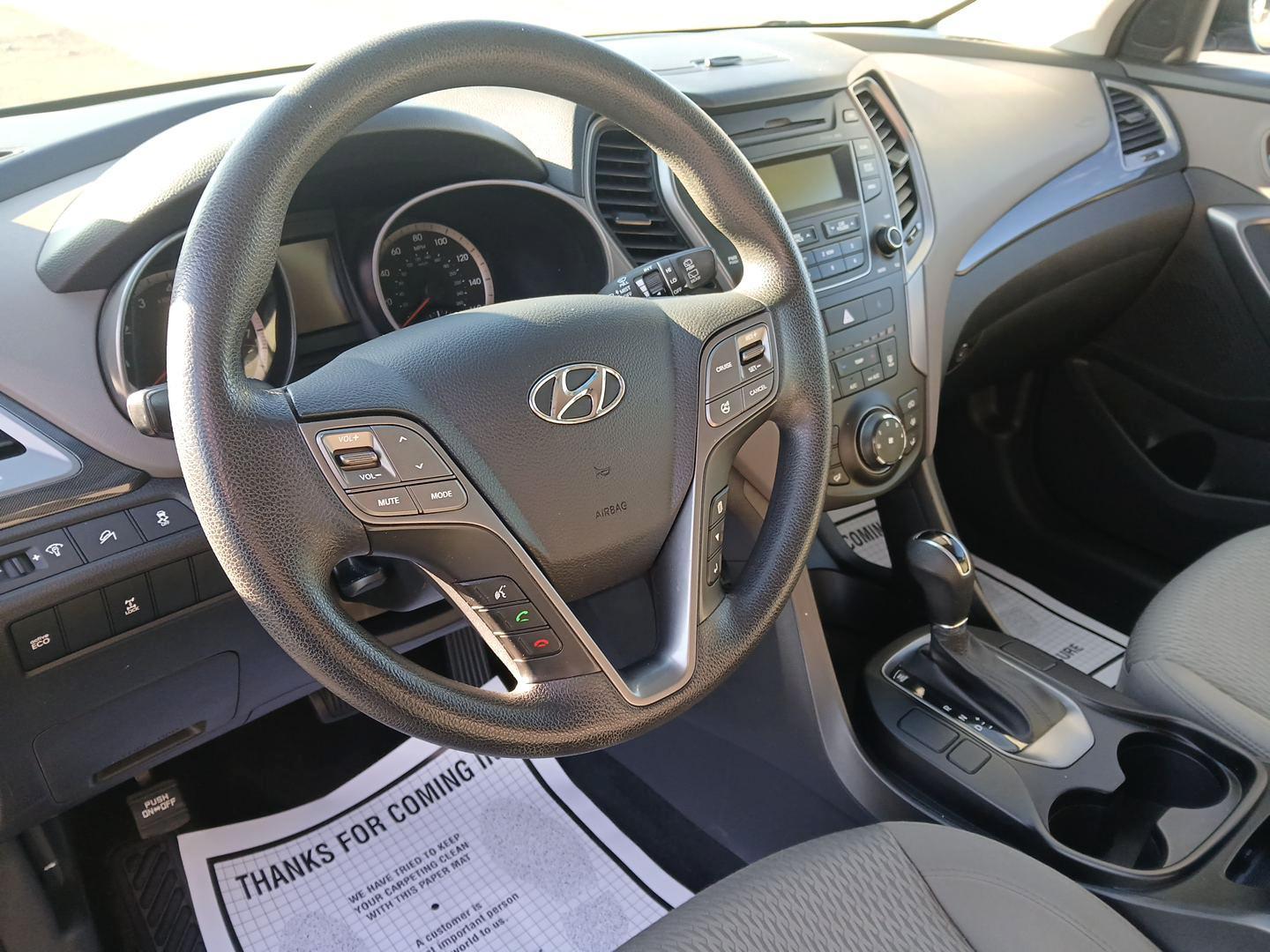 2014 Moonstone Silver Hyundai Santa Fe Sport 2.4 AWD (5XYZTDLB2EG) with an 2.4L L4 DOHC 16V engine, 6-Speed Automatic transmission, located at 1099 N County Rd 25A , Troy, OH, 45373, (937) 908-9800, 40.057079, -84.212883 - Photo#8