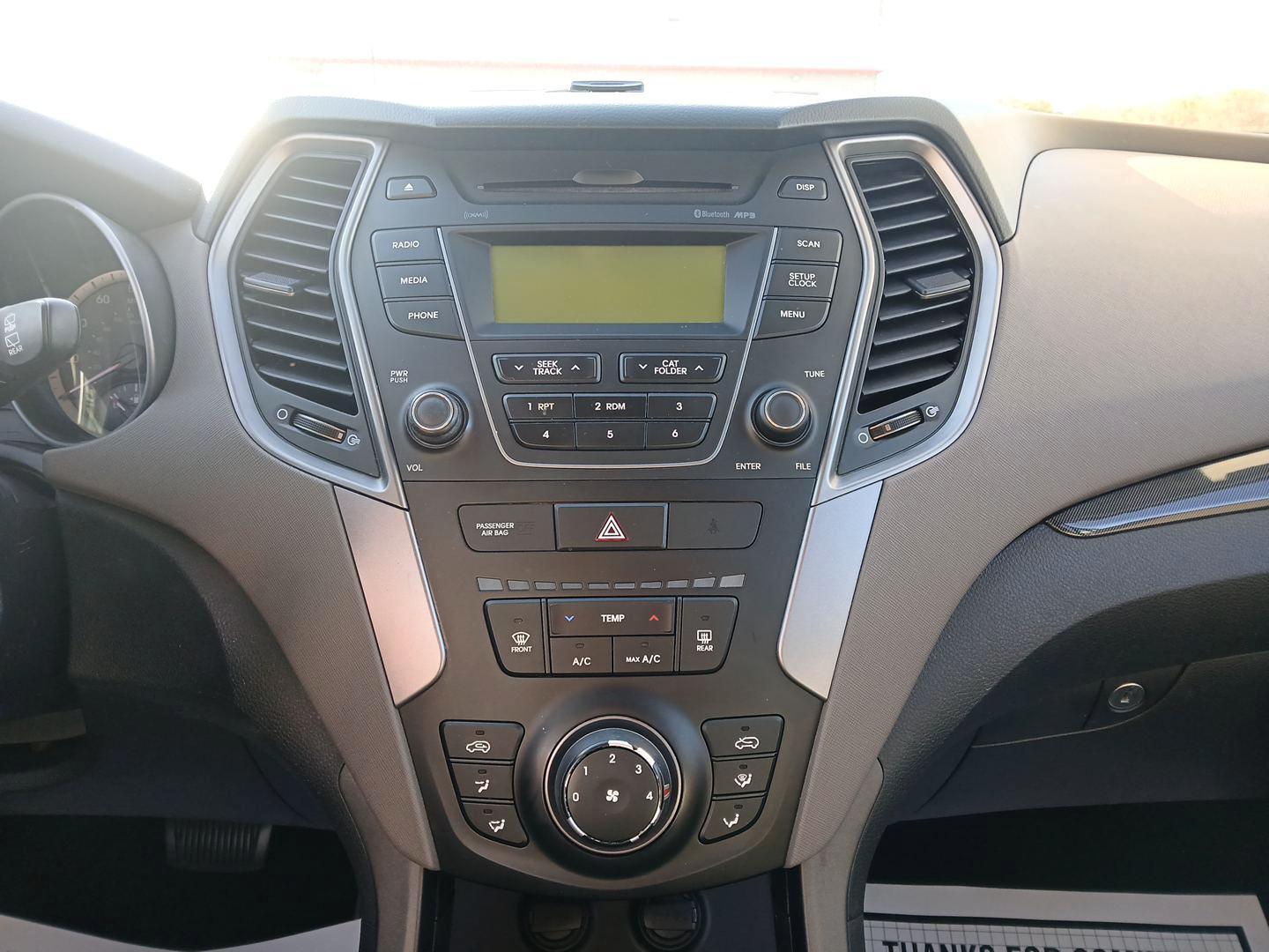 2014 Moonstone Silver Hyundai Santa Fe Sport 2.4 AWD (5XYZTDLB2EG) with an 2.4L L4 DOHC 16V engine, 6-Speed Automatic transmission, located at 1099 N County Rd 25A , Troy, OH, 45373, (937) 908-9800, 40.057079, -84.212883 - Photo#12