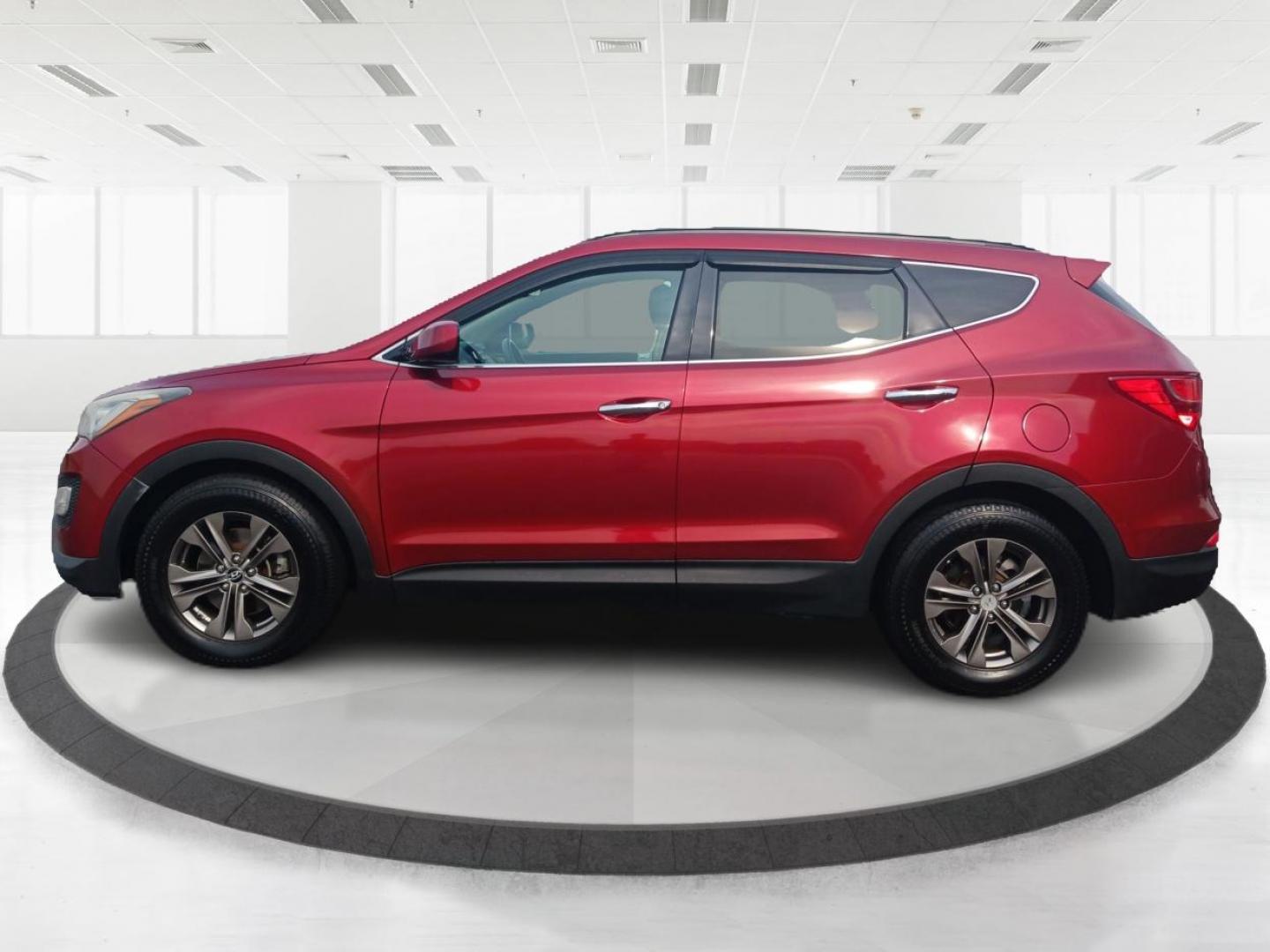 2014 Serrano Red Hyundai Santa Fe Sport 2.4 FWD (5XYZU3LB0EG) with an 2.4L L4 DOHC 16V engine, 6-Speed Automatic transmission, located at 4508 South Dixie Dr, Moraine, OH, 45439, (937) 908-9800, 39.689976, -84.218452 - Photo#5