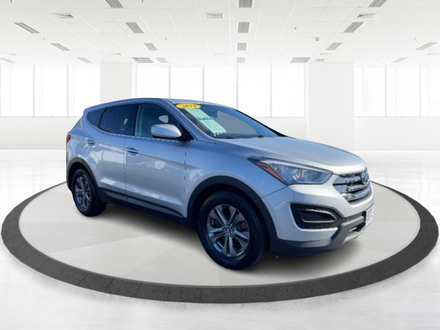 2014 Moonstone Silver Hyundai Santa Fe (5XYZTDLB2EG) with an 2.4L L4 DOHC 16V engine, 6-Speed Automatic transmission, located at 1099 N County Rd 25A , Troy, OH, 45373, (937) 908-9800, 40.057079, -84.212883 - Photo#0