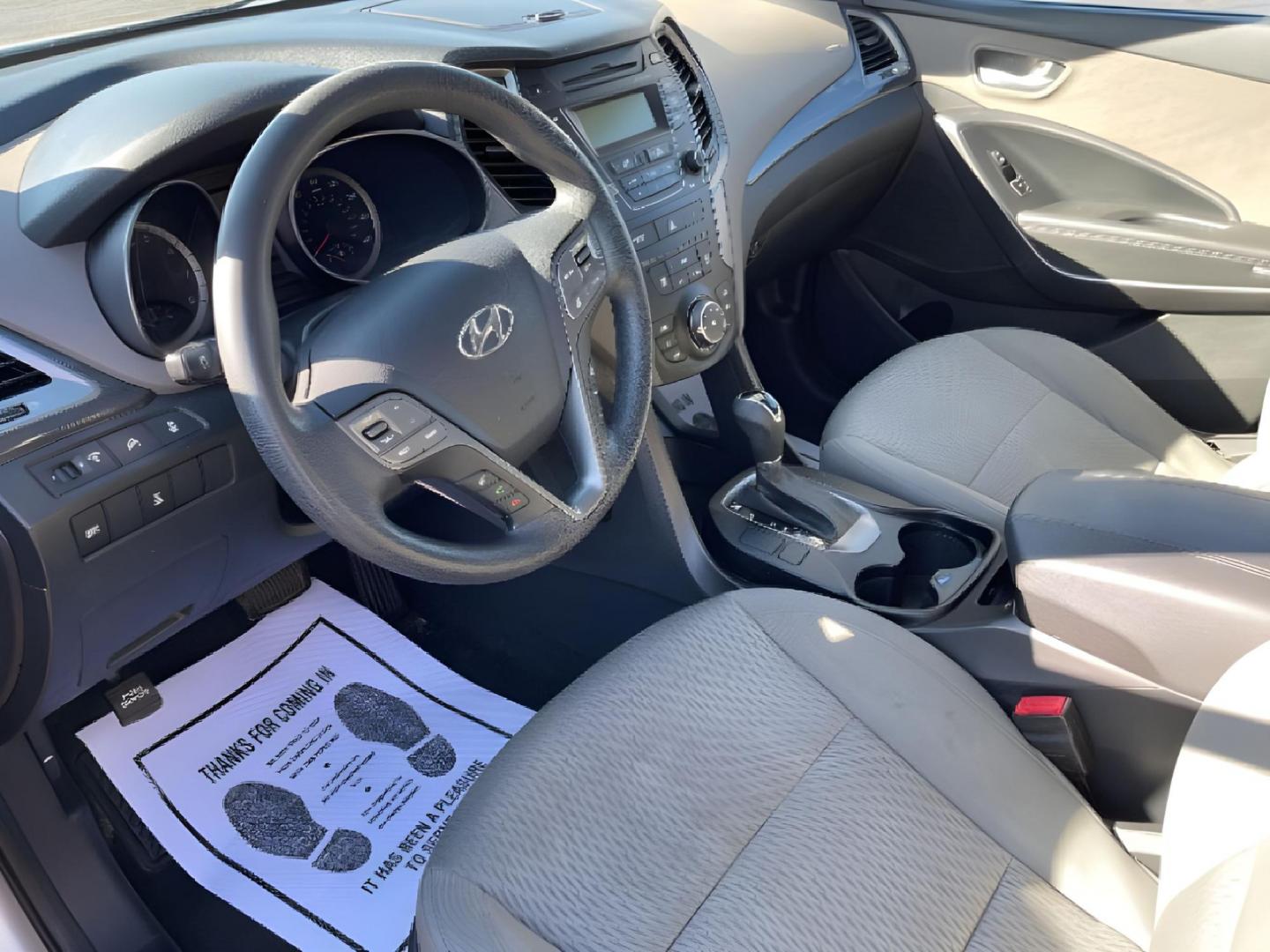 2014 Moonstone Silver Hyundai Santa Fe (5XYZTDLB2EG) with an 2.4L L4 DOHC 16V engine, 6-Speed Automatic transmission, located at 1099 N County Rd 25A , Troy, OH, 45373, (937) 908-9800, 40.057079, -84.212883 - Photo#5