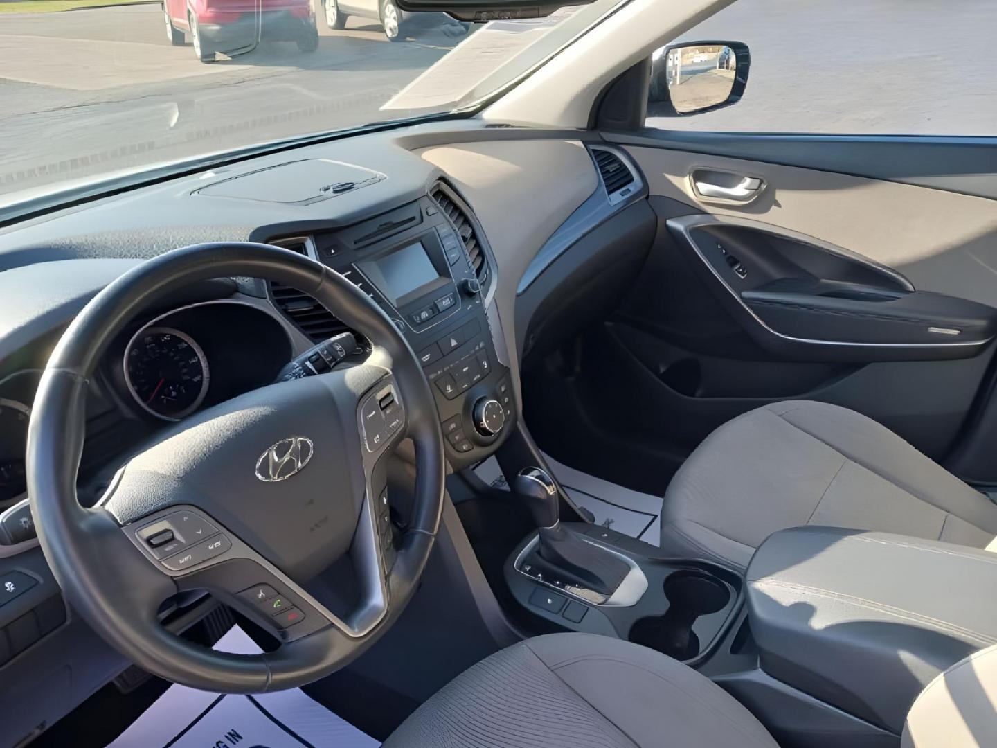 2014 Moonstone Silver Hyundai Santa Fe Sport 2.4 FWD (5XYZU3LB3EG) with an 2.4L L4 DOHC 16V engine, 6-Speed Automatic transmission, located at 1951 S Dayton Lakeview Rd., New Carlisle, OH, 45344, (937) 908-9800, 39.890999, -84.050255 - Photo#13