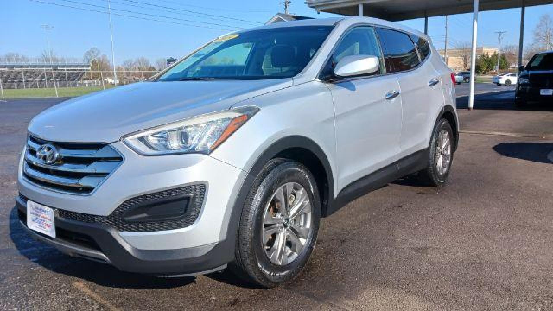 2014 Moonstone Silver Hyundai Santa Fe Sport 2.4 FWD (5XYZT3LB5EG) with an 2.4L L4 DOHC 16V engine, 6-Speed Automatic transmission, located at 8750 N County Rd 25A, Piqua, OH, 45356, (937) 908-9800, 40.164391, -84.232513 - Photo#4