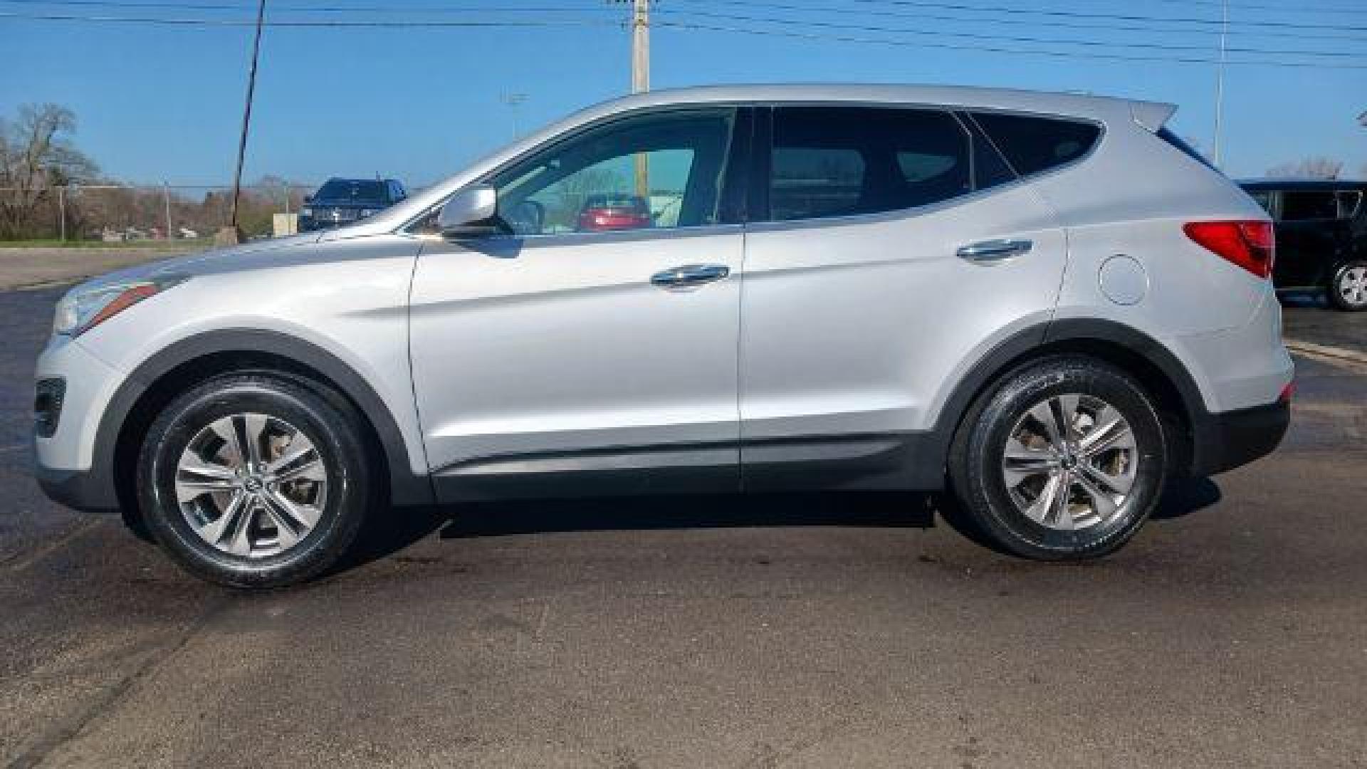 2014 Moonstone Silver Hyundai Santa Fe Sport 2.4 FWD (5XYZT3LB5EG) with an 2.4L L4 DOHC 16V engine, 6-Speed Automatic transmission, located at 8750 N County Rd 25A, Piqua, OH, 45356, (937) 908-9800, 40.164391, -84.232513 - Photo#6