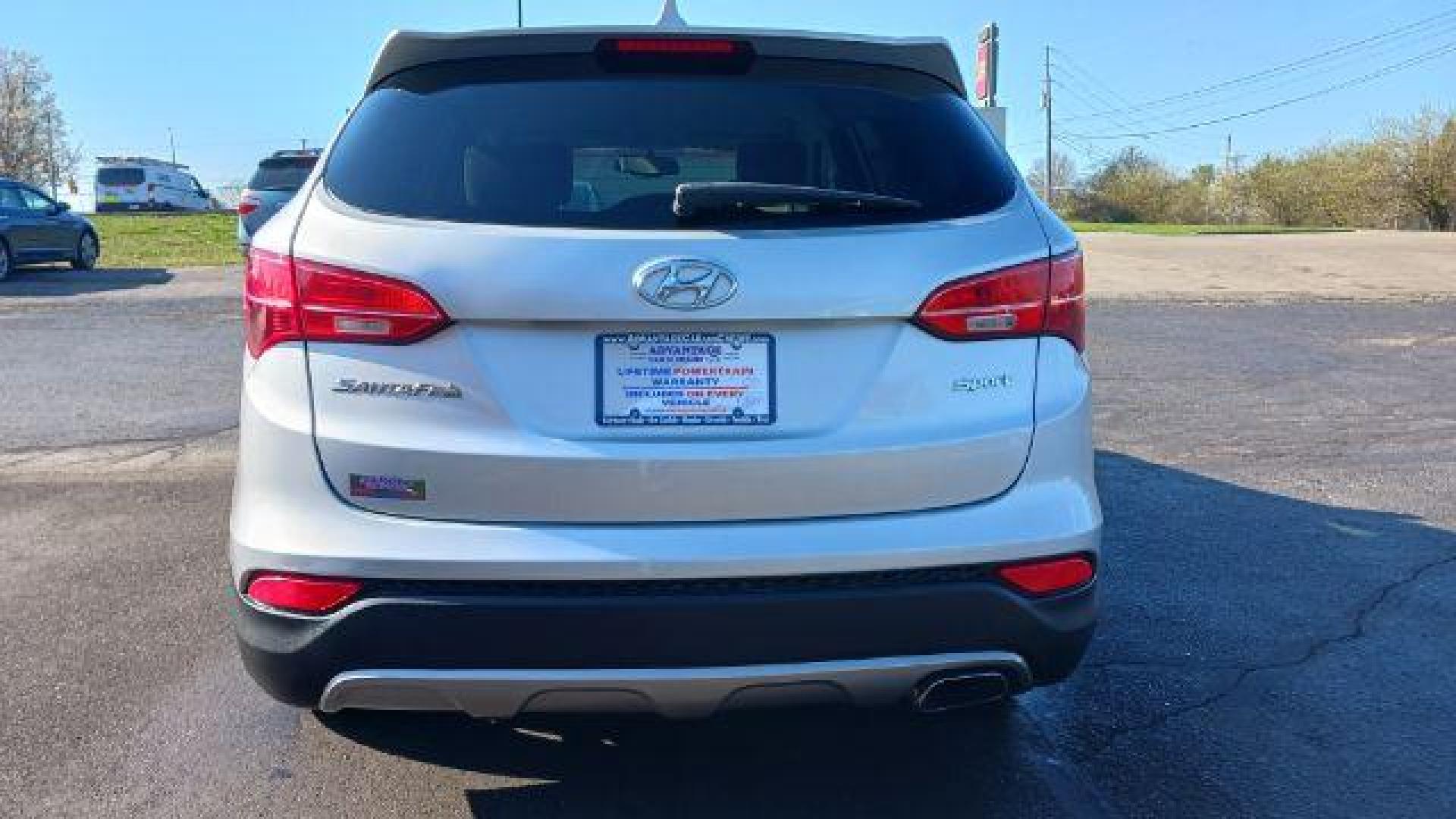 2014 Moonstone Silver Hyundai Santa Fe Sport 2.4 FWD (5XYZT3LB5EG) with an 2.4L L4 DOHC 16V engine, 6-Speed Automatic transmission, located at 8750 N County Rd 25A, Piqua, OH, 45356, (937) 908-9800, 40.164391, -84.232513 - Photo#10