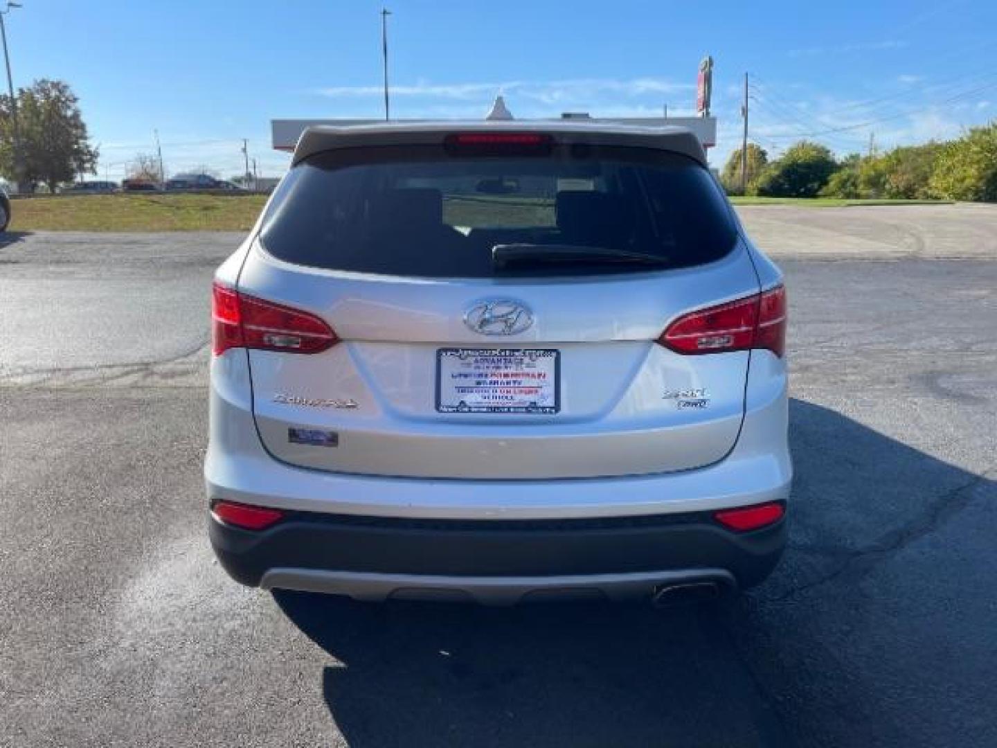 2014 Moonstone Silver Hyundai Santa Fe Sport 2.4 AWD (5XYZTDLB2EG) with an 2.4L L4 DOHC 16V engine, 6-Speed Automatic transmission, located at 1099 N County Rd 25A , Troy, OH, 45373, (937) 908-9800, 40.057079, -84.212883 - Photo#6