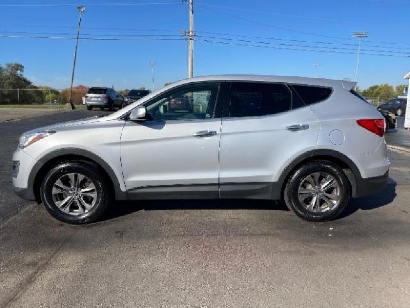 2014 Moonstone Silver Hyundai Santa Fe Sport 2.4 AWD (5XYZTDLB2EG) with an 2.4L L4 DOHC 16V engine, 6-Speed Automatic transmission, located at 1099 N County Rd 25A , Troy, OH, 45373, (937) 908-9800, 40.057079, -84.212883 - Photo#8