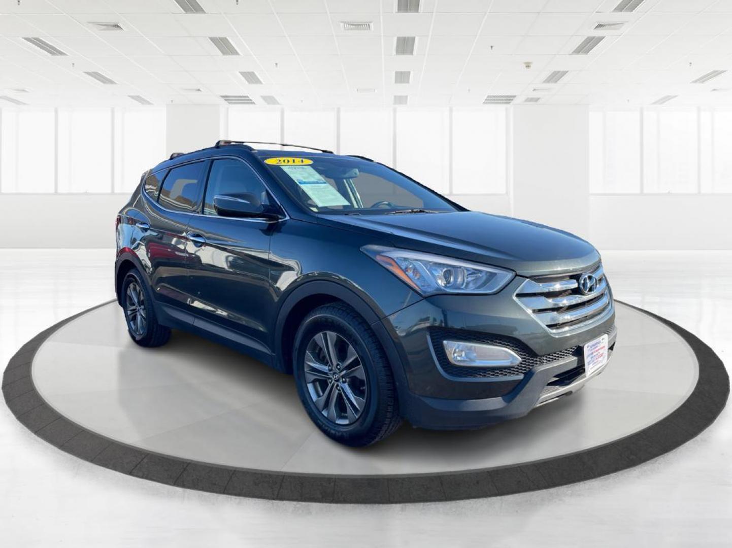 2014 Hyundai Santa Fe Sport 2.4 AWD (5XYZUDLB2EG) with an 2.4L L4 DOHC 16V engine, 6-Speed Automatic transmission, located at 880 E. National Road, Vandalia, OH, 45377, (937) 908-9800, 39.891918, -84.183594 - 2014 Hyundai Santa Fe Sport 2.4 AWD - Photo#0