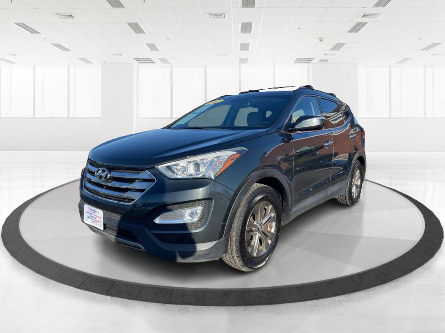 2014 Hyundai Santa Fe Sport 2.4 AWD (5XYZUDLB2EG) with an 2.4L L4 DOHC 16V engine, 6-Speed Automatic transmission, located at 880 E. National Road, Vandalia, OH, 45377, (937) 908-9800, 39.891918, -84.183594 - 2014 Hyundai Santa Fe Sport 2.4 AWD - Photo#7