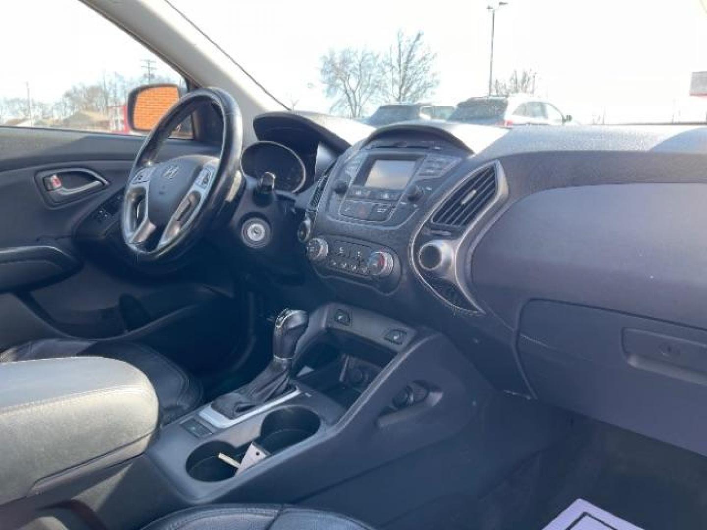 2014 Shadow Grey Hyundai Tucson GLS 2WD (KM8JU3AG9EU) with an 2.4L L4 DOHC 16V engine, 6-Speed Automatic transmission, located at 4508 South Dixie Dr, Moraine, OH, 45439, (937) 908-9800, 39.689976, -84.218452 - Photo#7