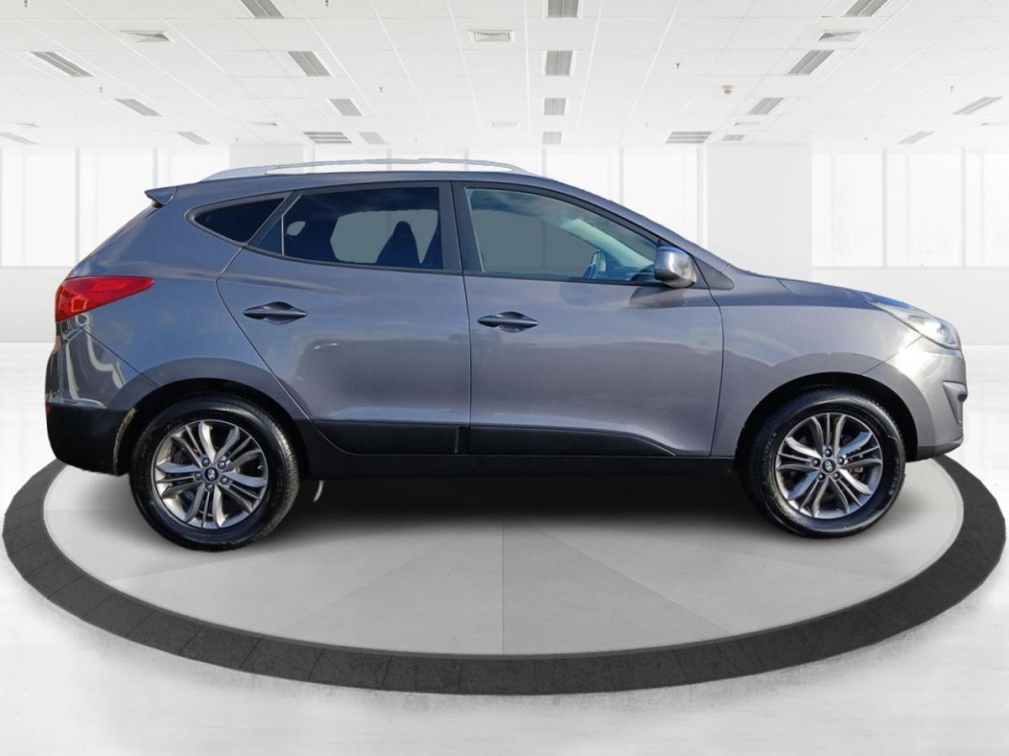 2014 Shadow Grey Hyundai Tucson GLS AWD (KM8JUCAG3EU) with an 2.4L L4 DOHC 16V engine, 6-Speed Automatic transmission, located at 1230 East Main St, Xenia, OH, 45385, (937) 908-9800, 39.688026, -83.910172 - Photo#1