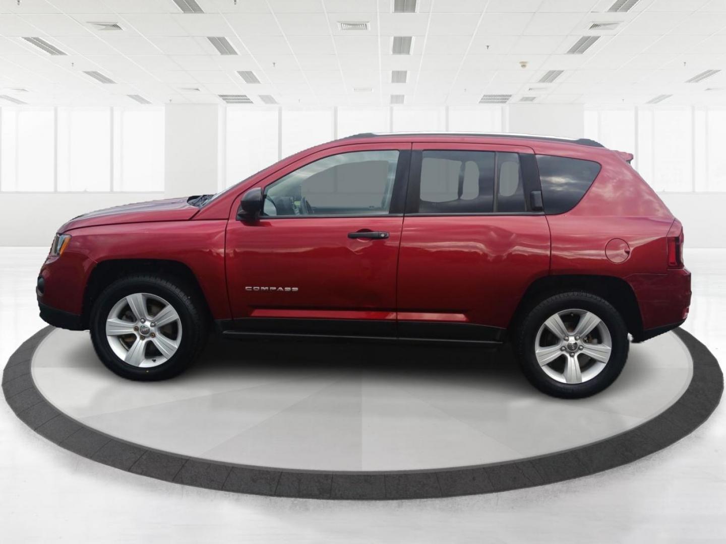 2014 Dp Cherry Red Crystal PC Jeep Compass Sport 4WD (1C4NJDBBXED) with an 2.4L L4 DOHC 16V engine, located at 1951 S Dayton Lakeview Rd., New Carlisle, OH, 45344, (937) 908-9800, 39.890999, -84.050255 - Photo#5