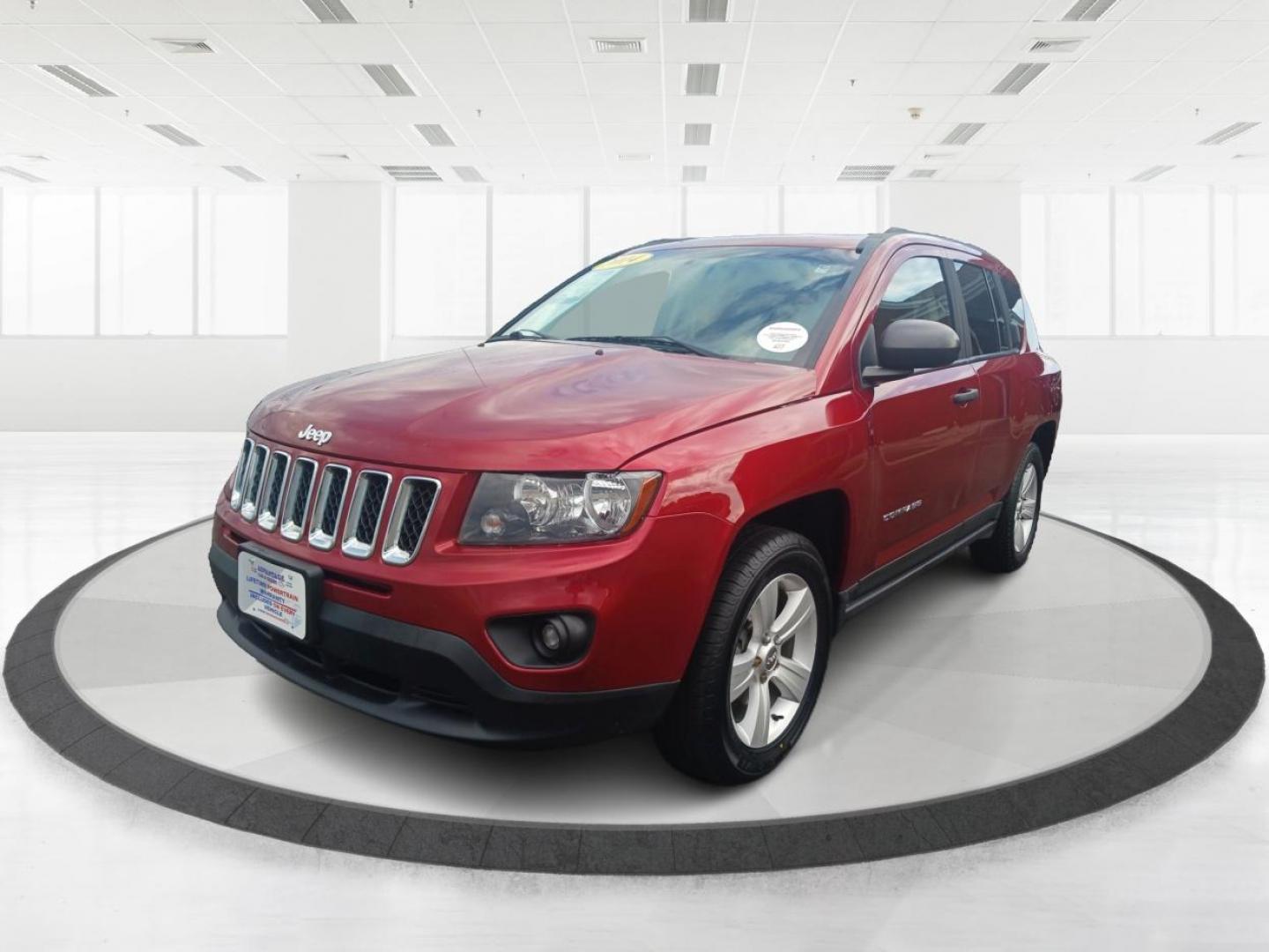 2014 Dp Cherry Red Crystal PC Jeep Compass Sport 4WD (1C4NJDBBXED) with an 2.4L L4 DOHC 16V engine, located at 1951 S Dayton Lakeview Rd., New Carlisle, OH, 45344, (937) 908-9800, 39.890999, -84.050255 - Photo#7