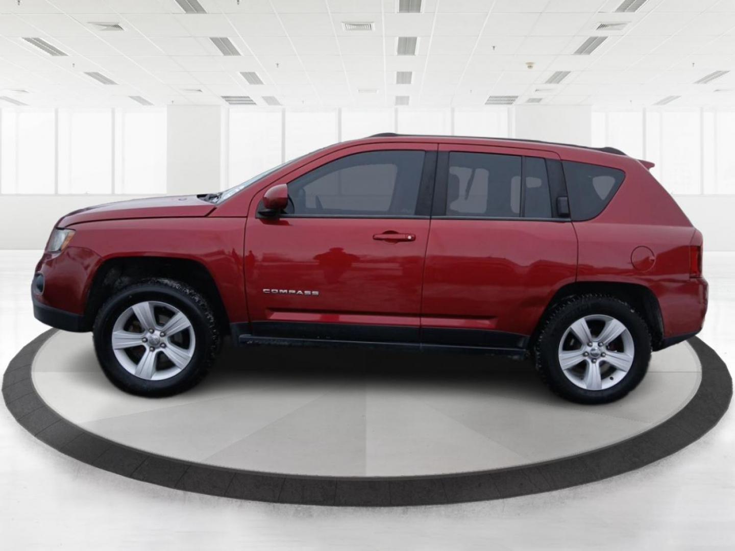 2014 Dp Cherry Red Crystal PC Jeep Compass Latitude 4WD (1C4NJDEB4ED) with an 2.4L L4 DOHC 16V engine, Continuously Variable Transmission transmission, located at 8750 N County Rd 25A, Piqua, OH, 45356, (937) 908-9800, 40.164391, -84.232513 - 2014 Jeep Compass Latitude 4WD - Photo#5