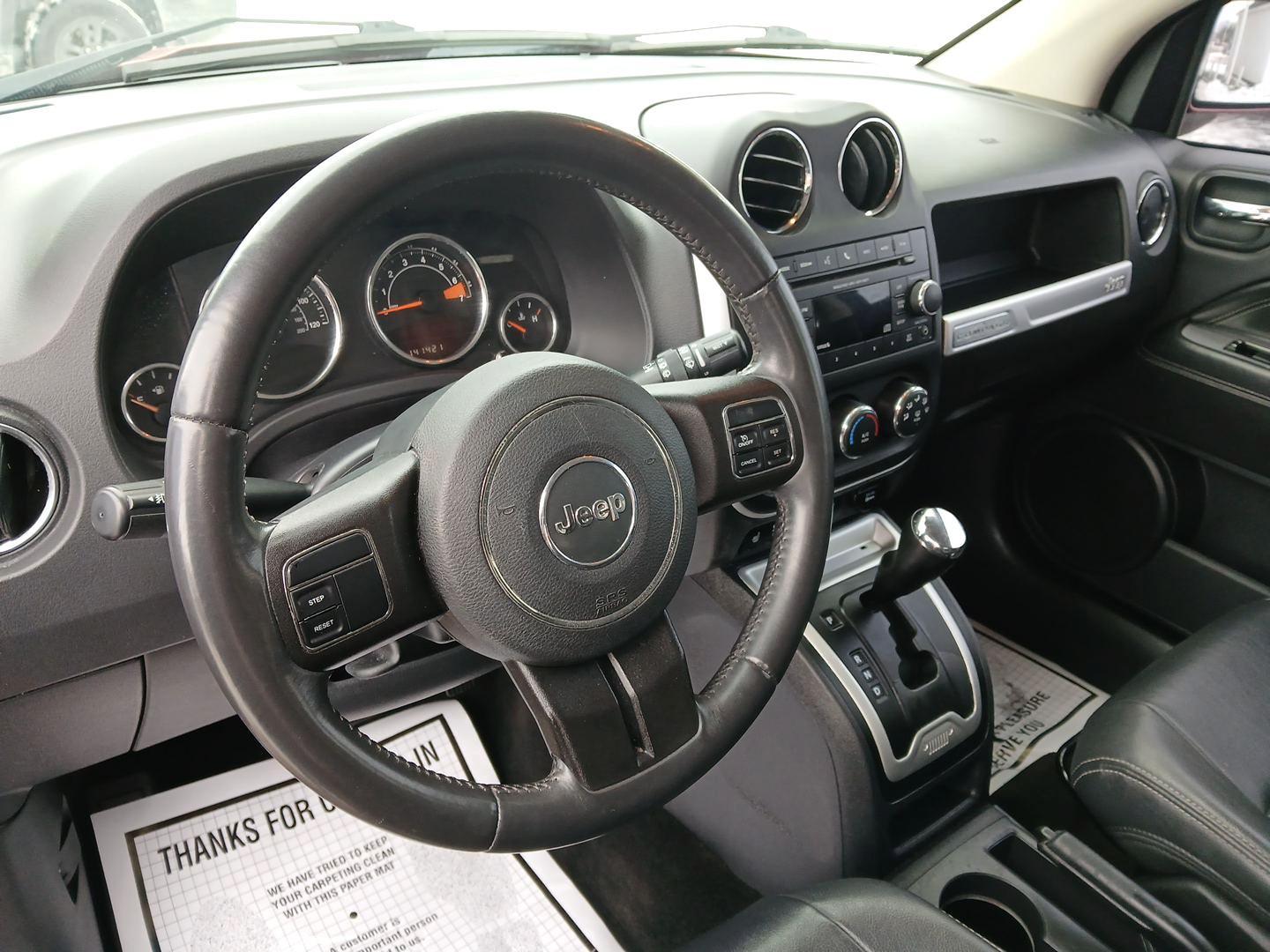 2014 Dp Cherry Red Crystal PC Jeep Compass Latitude 4WD (1C4NJDEB4ED) with an 2.4L L4 DOHC 16V engine, Continuously Variable Transmission transmission, located at 8750 N County Rd 25A, Piqua, OH, 45356, (937) 908-9800, 40.164391, -84.232513 - 2014 Jeep Compass Latitude 4WD - Photo#8