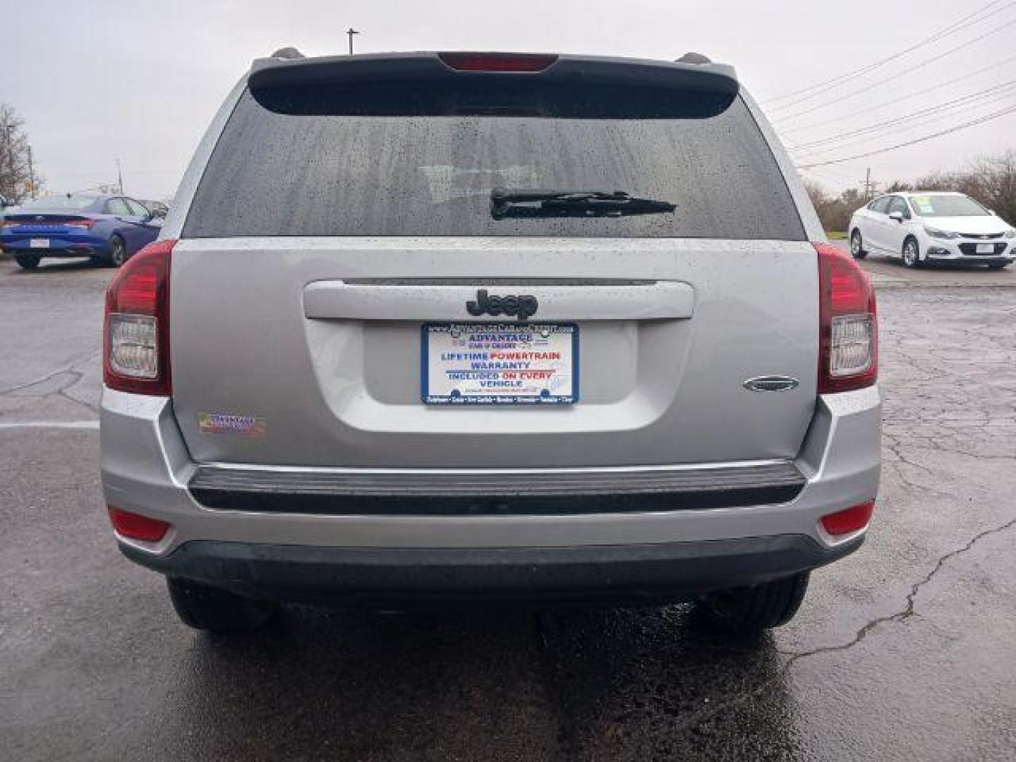 2014 Bright Silver Metallic CC Jeep Compass Sport FWD (1C4NJCBAXED) with an 2.0L L4 DOHC 16V engine, located at 1099 N County Rd 25A , Troy, OH, 45373, (937) 908-9800, 40.057079, -84.212883 - Photo#5