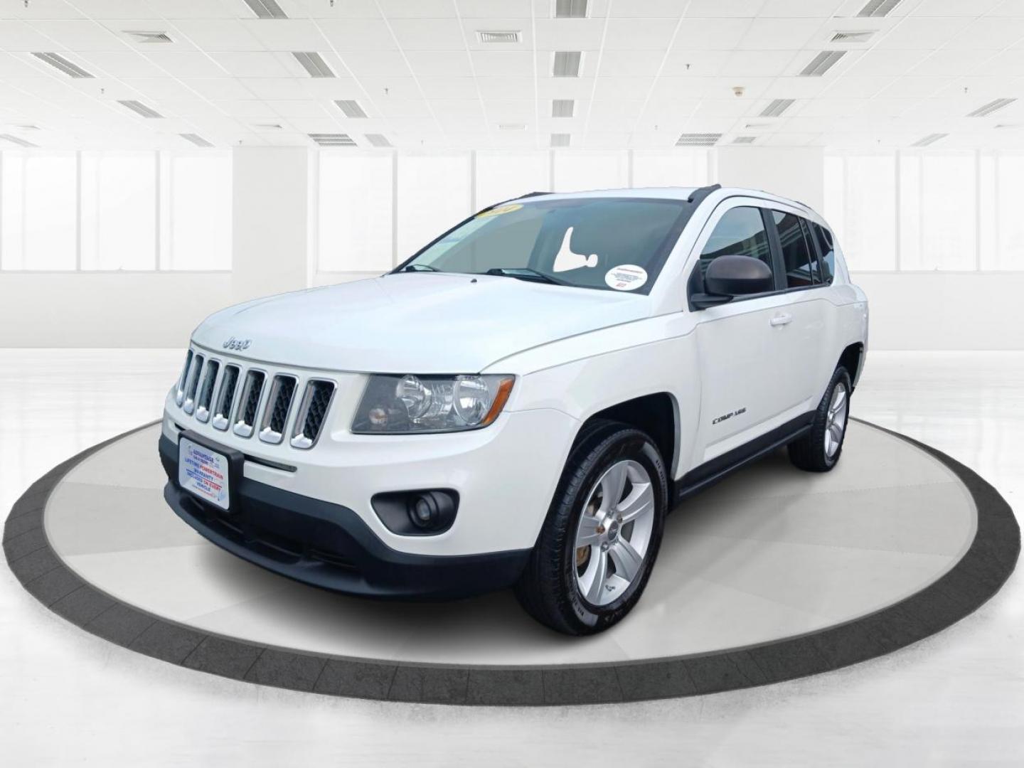 2014 Winter Chill Pearlcoat Jeep Compass (1C4NJDBB1ED) with an 2.4L L4 DOHC 16V engine, located at 880 E. National Road, Vandalia, OH, 45377, (937) 908-9800, 39.891918, -84.183594 - Photo#4