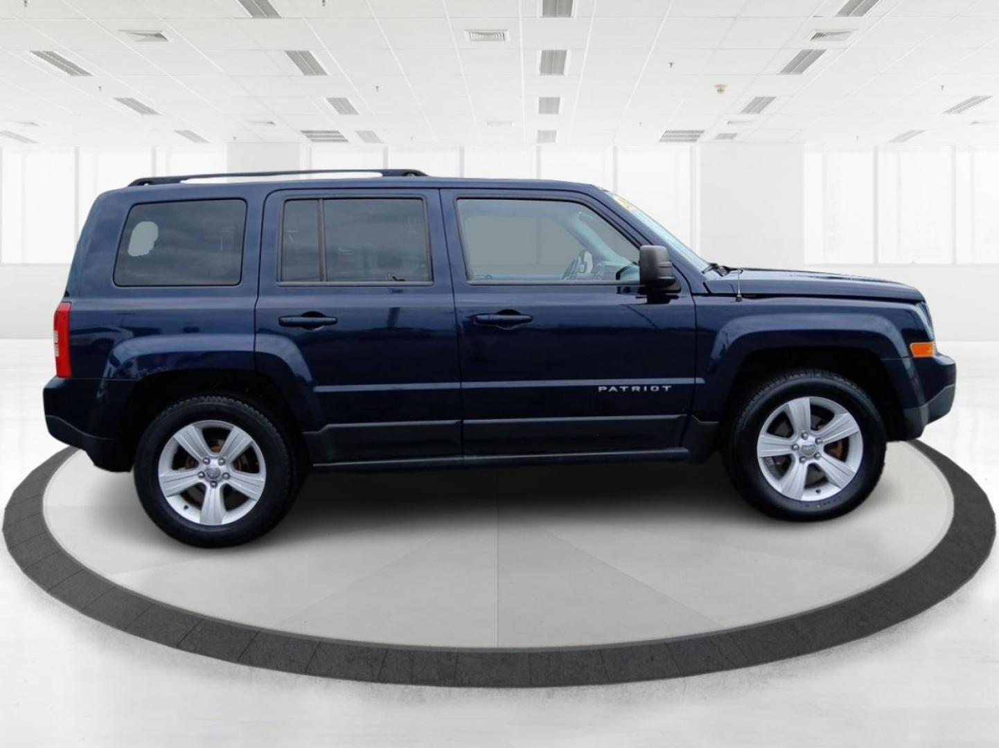 2014 True Blue Pearlcoat Jeep Patriot (1C4NJRBB3ED) with an 2.4L L4 DOHC 16V engine, located at 4508 South Dixie Dr, Moraine, OH, 45439, (937) 908-9800, 39.689976, -84.218452 - Photo#1